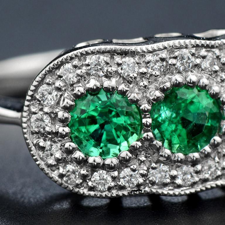 For Sale:  Round Emerald with Diamond Three Stone Ring in 18K White Gold 6