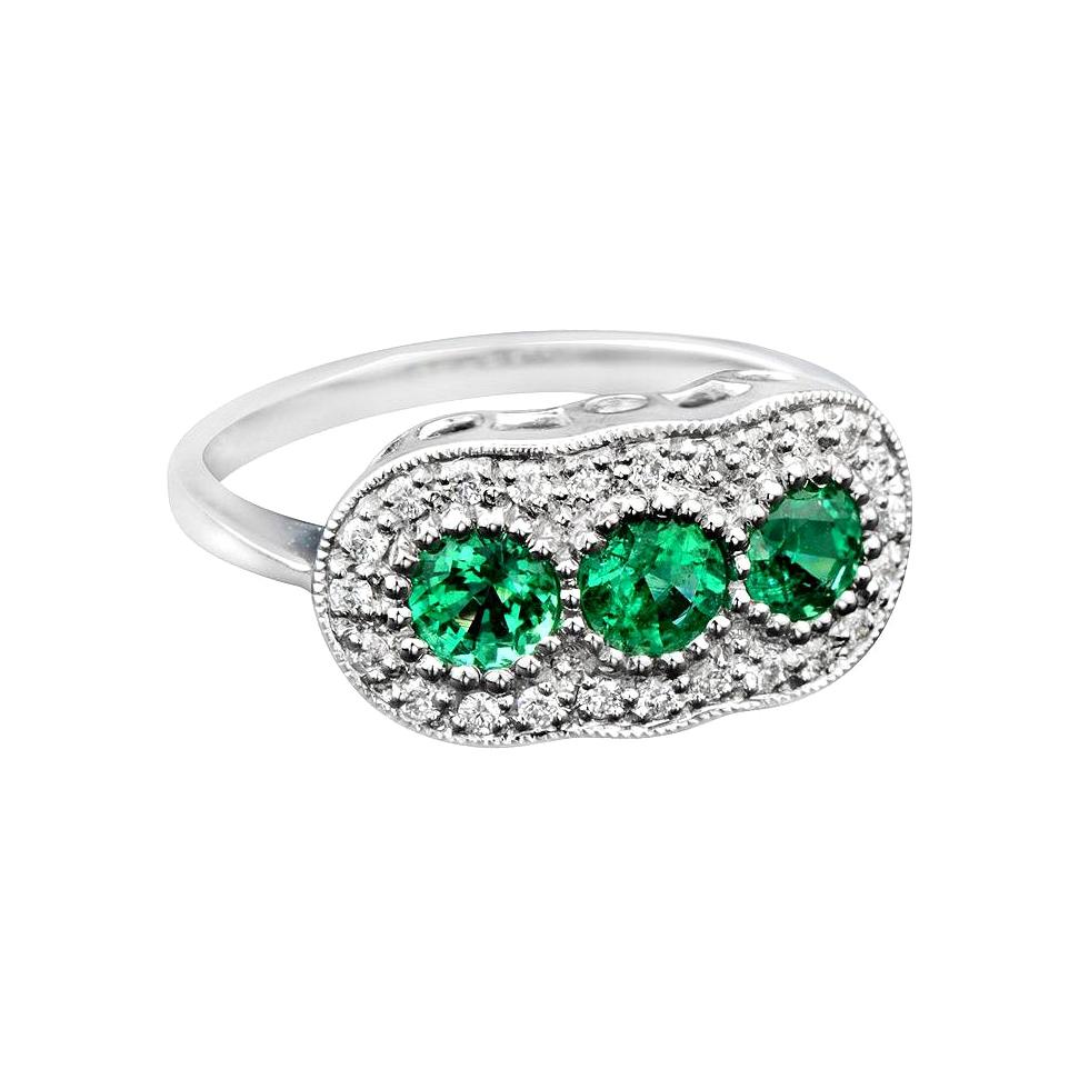 For Sale:  Round Emerald with Diamond Three Stone Ring in 18K White Gold