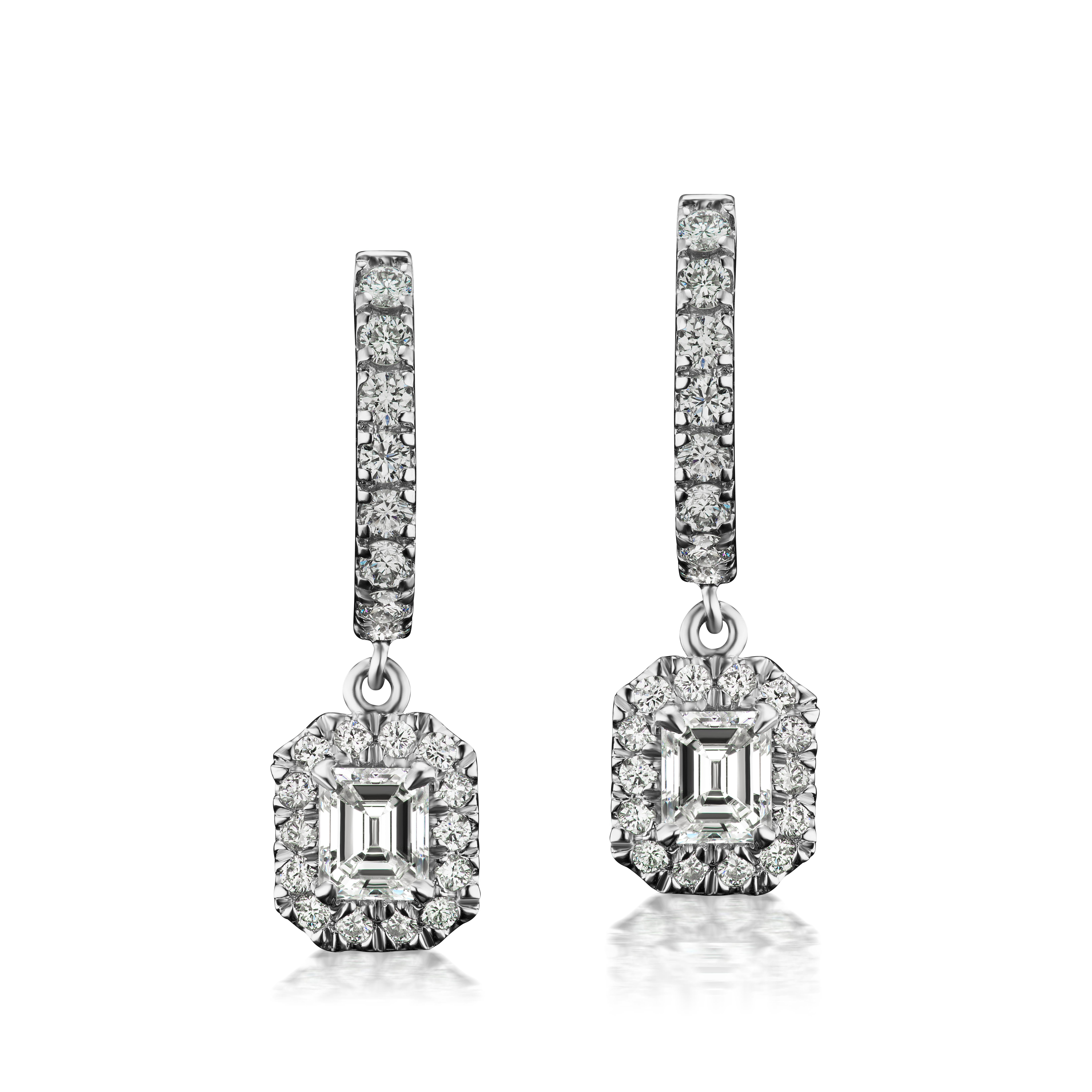 Emerald Diamond Dangling Drop Earrings in 14K White Gold. ( 1.49 Ct tw.)

Why We Love It:
Everyday Luxury.
This emerald cut diamond is such a dream! Excellent specs with sleek lines and a lovely shape!
The unique look of the emerald cut diamond is