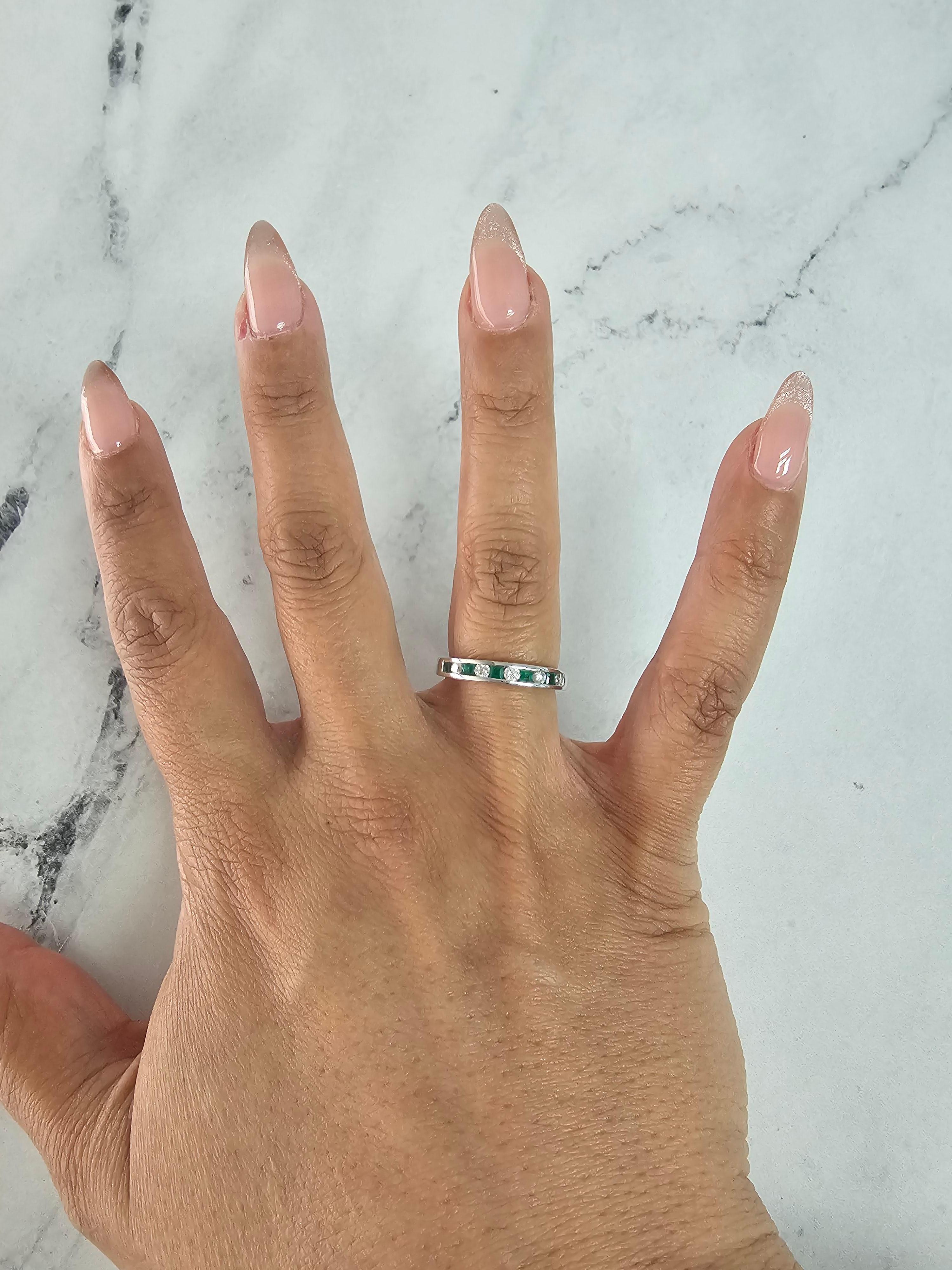 ♥ Product Summary ♥

Main Stone: Diamond & Emerald 
Approx. Carat Weight: .56cttw
Emerald Carat Weight: .28ct
Diamond Color: G/H
Diamond Clarity: SI1
Stone Cut: Round & Princess
Material: 14k White Gold
Width: 3.5mm
Weight: 3 grams

Diamonds &
