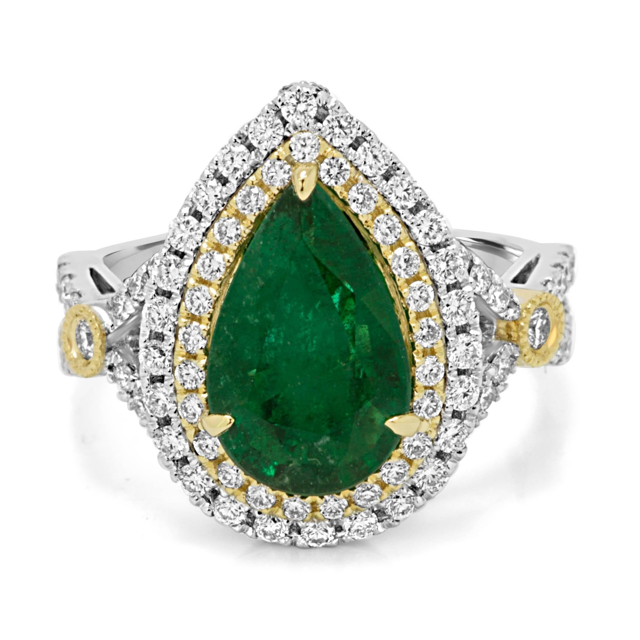 Exquisite Emerald Pear 2.33 Carat Encircled in a Double Halo of Colorless Round VS-SI  Diamonds 1.00 Carat in 14K White and Yellow Gold Ring.

Style available in different price ranges. Prices are based on your selection of 4C's Cut, Color, Carat,
