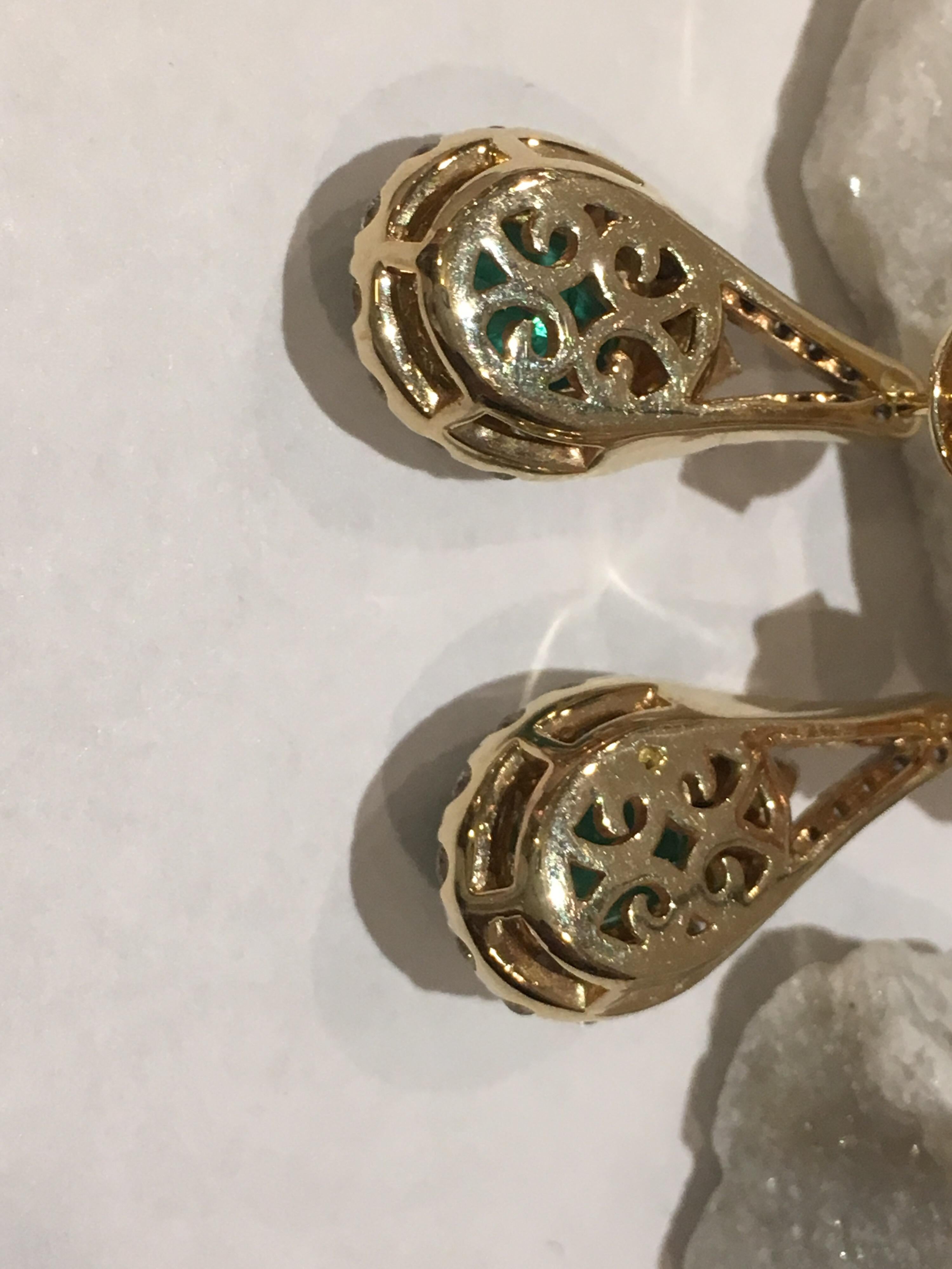 Artisan Emerald Diamond Earring set in 14 Karat Yellow Gold