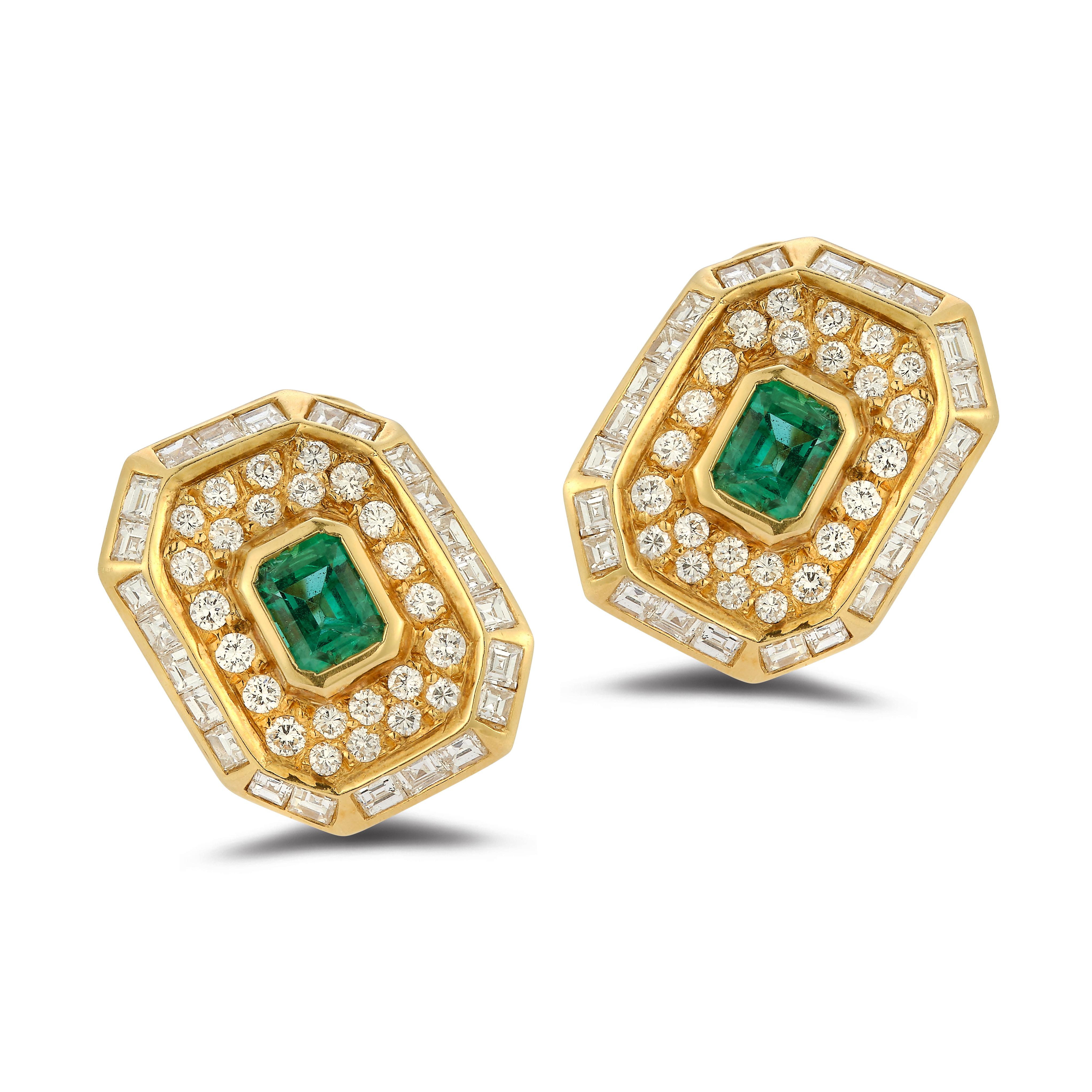 Emerald Cut Emerald & Diamond Earrings

18k gold earrings each set with a central emerald cut emerald surrounded by round and baguette diamonds.

Emerald total approximate weight: 1.40ct

Diamonds total approximate weight: 2.68ct

Measurements: .75