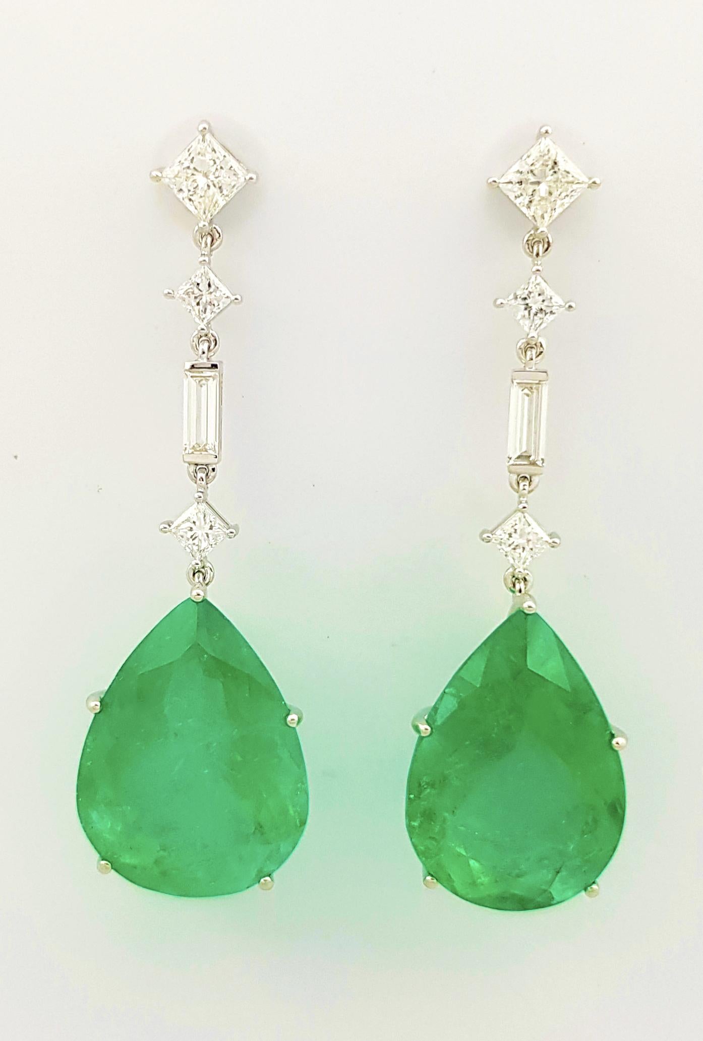 Emerald (2) 50.26 carats, Diamond (2) 1.40 carats and Diamond 1.61 carats Earrings set in Platinum 950 Settings
(GIA Certified)

Width:  1.8 cm 
Length: 5.9 cm
Total Weight: 23.91 grams

Laboratory Certificates
Emerald : GIA 6475057303
Diamond : GIA