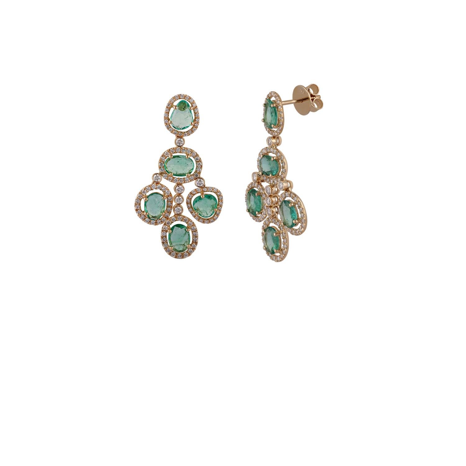 This is an exclusive pair of emerald & diamond earrings features 10 pieces of emeralds weight 4.81 carats surrounded by the cluster of diamonds weight 1.43 carats, the earrings entirely made in 18k yellow gold weight 7.41 grams, these  earrings have