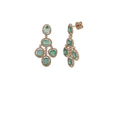 Orecchini con smeraldo e diamante tempestati di oro giallo 18 carati