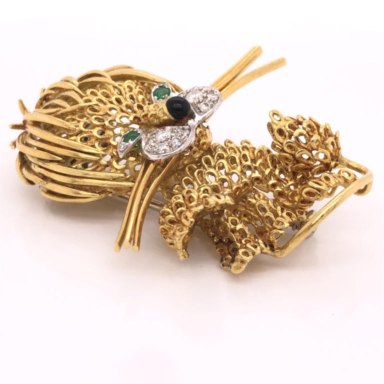 Beautiful brooch crafted in 18k yellow gold. This brooch is crafted in the style of the famed VCA ebouriffe lion brooch, with exact details shown in the design.  The brooch is crafted in Italy and shows import hallmarks as well as metal content. The
