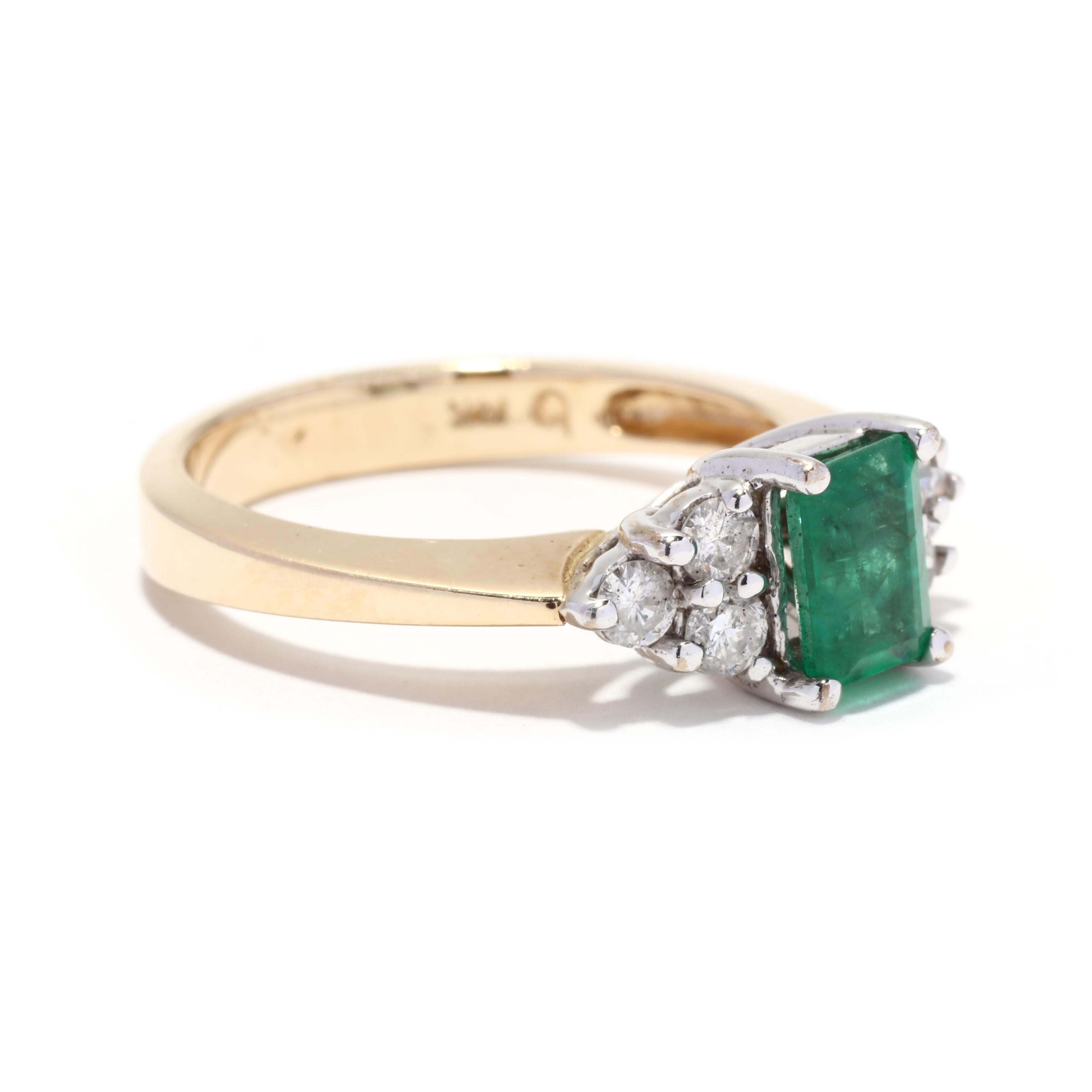 A vintage 14 karat bi color gold emerald and diamond engagement ring. This minimalist ring features a prong set, emerald cut emerald weighing approximately .77  carat with three round brilliant cut diamonds on either side weighing approximately .36