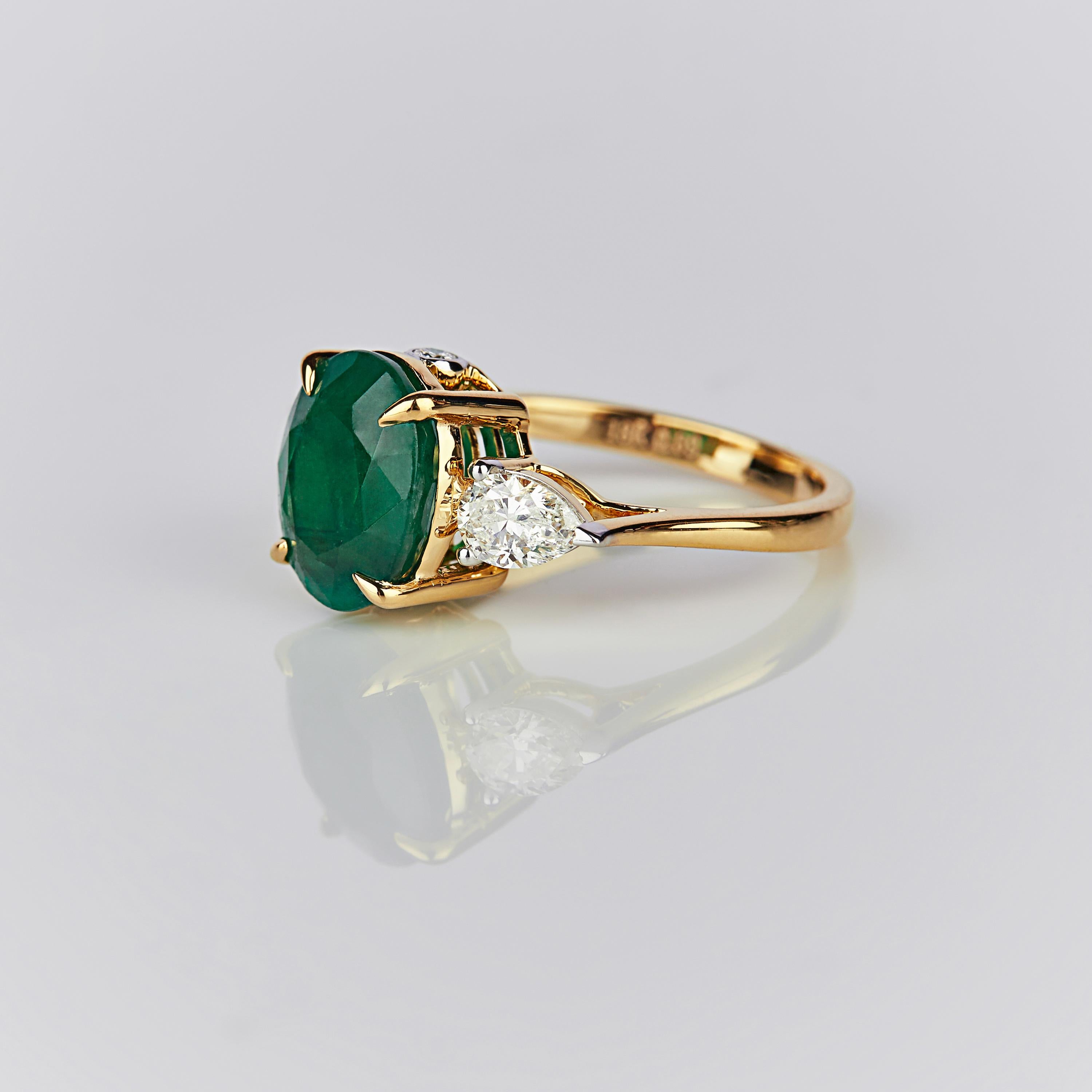 This Ring is set in 4.72 grams of White Gold surrounded by Pear cut and Round cut diamonds VS/G quality and color weighing 0.69 carats and Oval cut Emerald in the center of 3.33 carats.

Should this ring pique your interest, do check out our