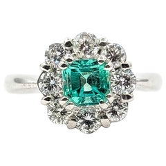 Emerald & Diamond Floral Halo Ring in Platinum