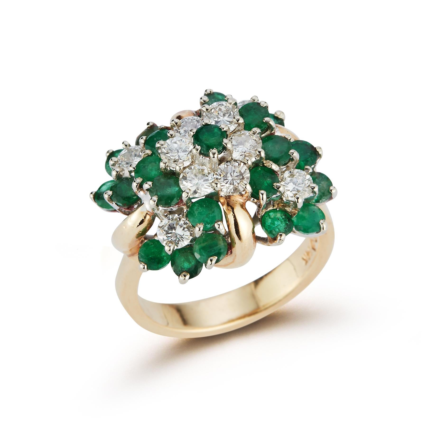 Emerald & Diamond Flower Cluster Ring 
14K yellow gold ring with center cluster of 10 brilliant cut diamonds approximately 1.20 cts, and 23 round emeralds approximately 2.35 cts.
Ring Size: 7
Re sizable free of charge 