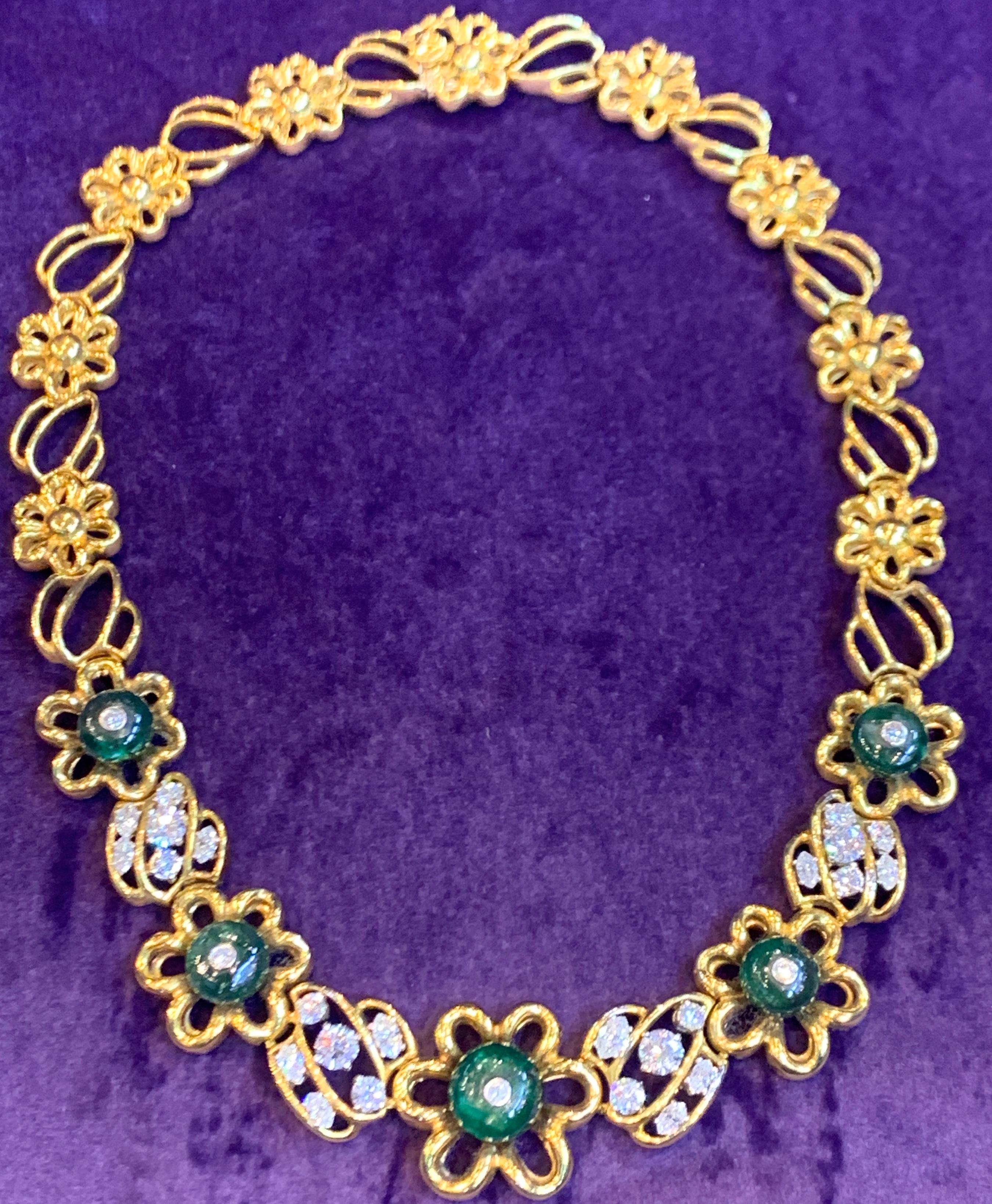 Emerald & Diamond Flower Link Necklace, Made By Elan
Gold Type: 18K Yellow Gold 
Emerald Weight: 39.00 Cts
Diamond Weight: 4.50 Cts
Measurements: 14