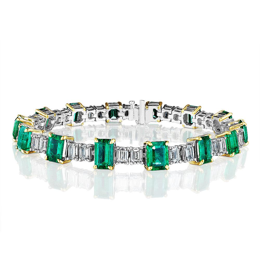 •	Platinum & 18K Two Tone
•	7.25” Long
•	Carat Weight: 24.15ct

•	Number of Green Emeralds: 14
•	Carat Weight: 15.57ctw

•	Number of Emerald Cut Diamonds: 28
•	Carat Weight: 8.58ctw
•	Color: E-F
•	Clarity: VVS2 – SI2
•	All Diamonds are GIA