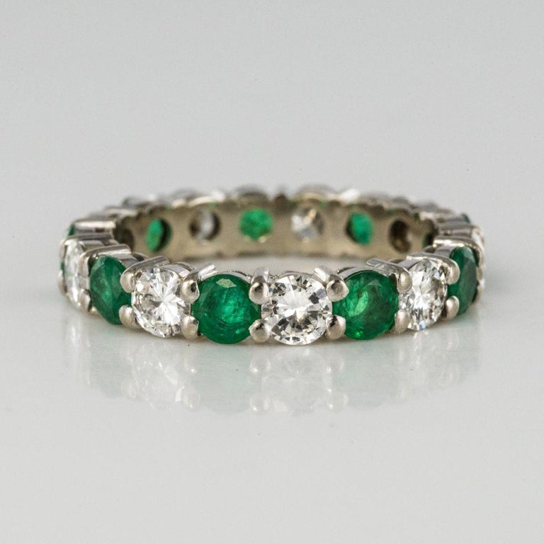 Modern Emerald Diamond Gold Eternity Ring For Sale