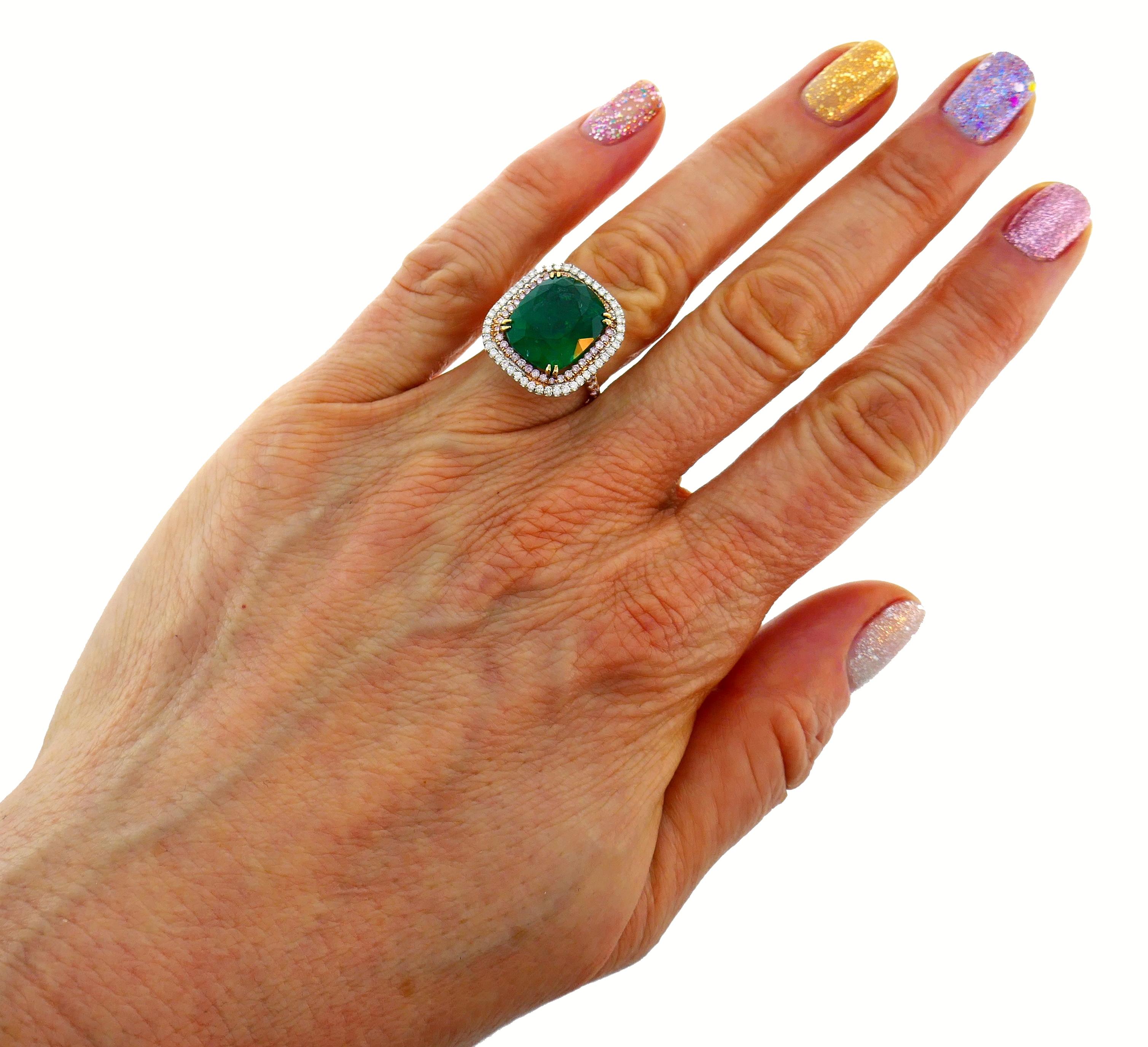 Sparkly and colorful ring. Timeless, chic and elegant, the ring is a great addition to your jewelry collection.
It is made of 18 karat (stamped) rose and white gold and features a gorgeous color 10.50-carat cushion cut emerald framed by a row of