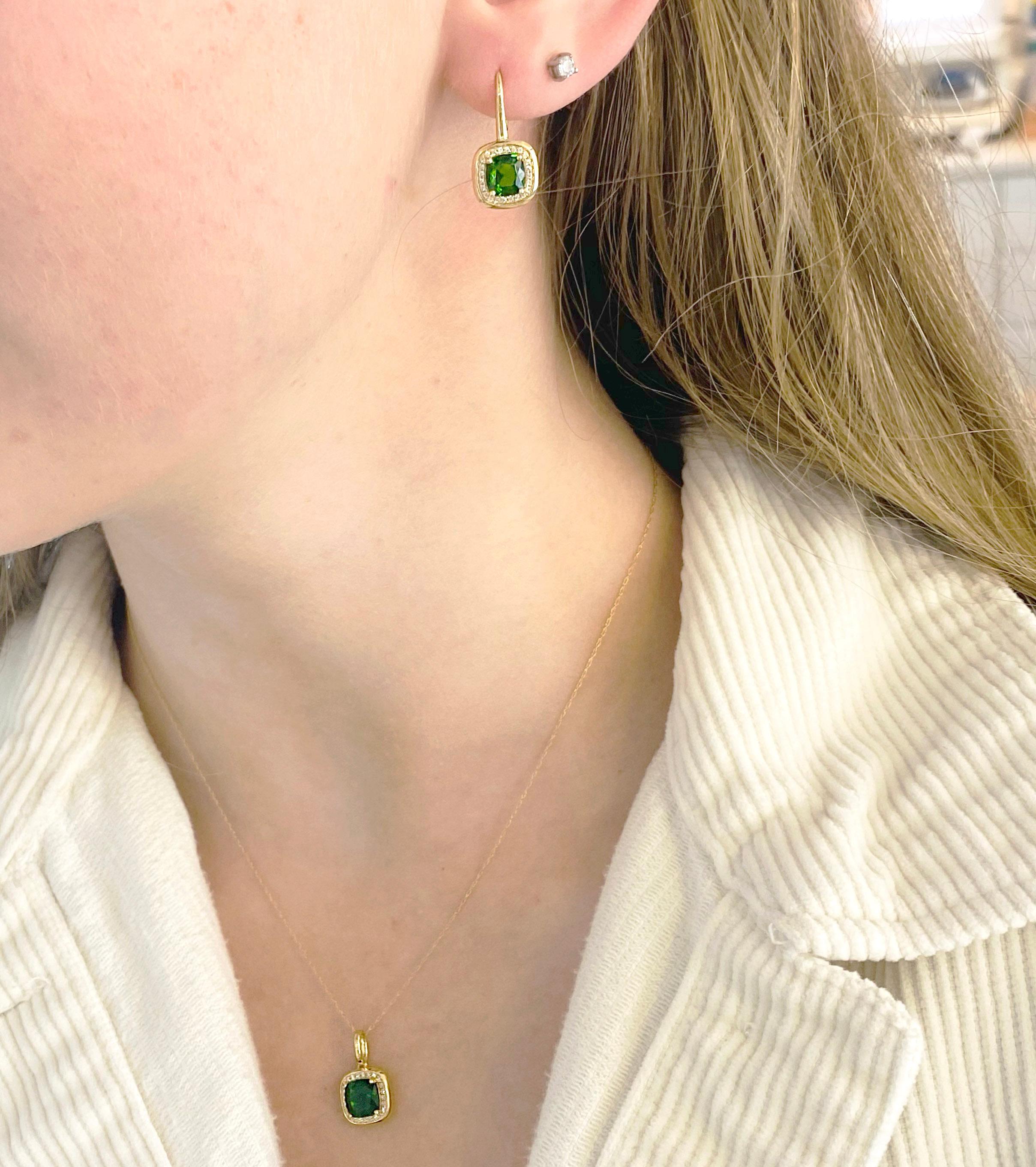 These pristine earrings have amazing quality.  The Russalite is a rich green color and the diamonds going around the cushion shaped stone is perfect. Russalite is a natural genuine gemstone that is mined in Siberia.  It has not be treated and is a