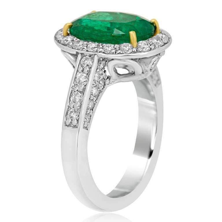 Oval Cut Emerald Diamond Halo Platinum Ring