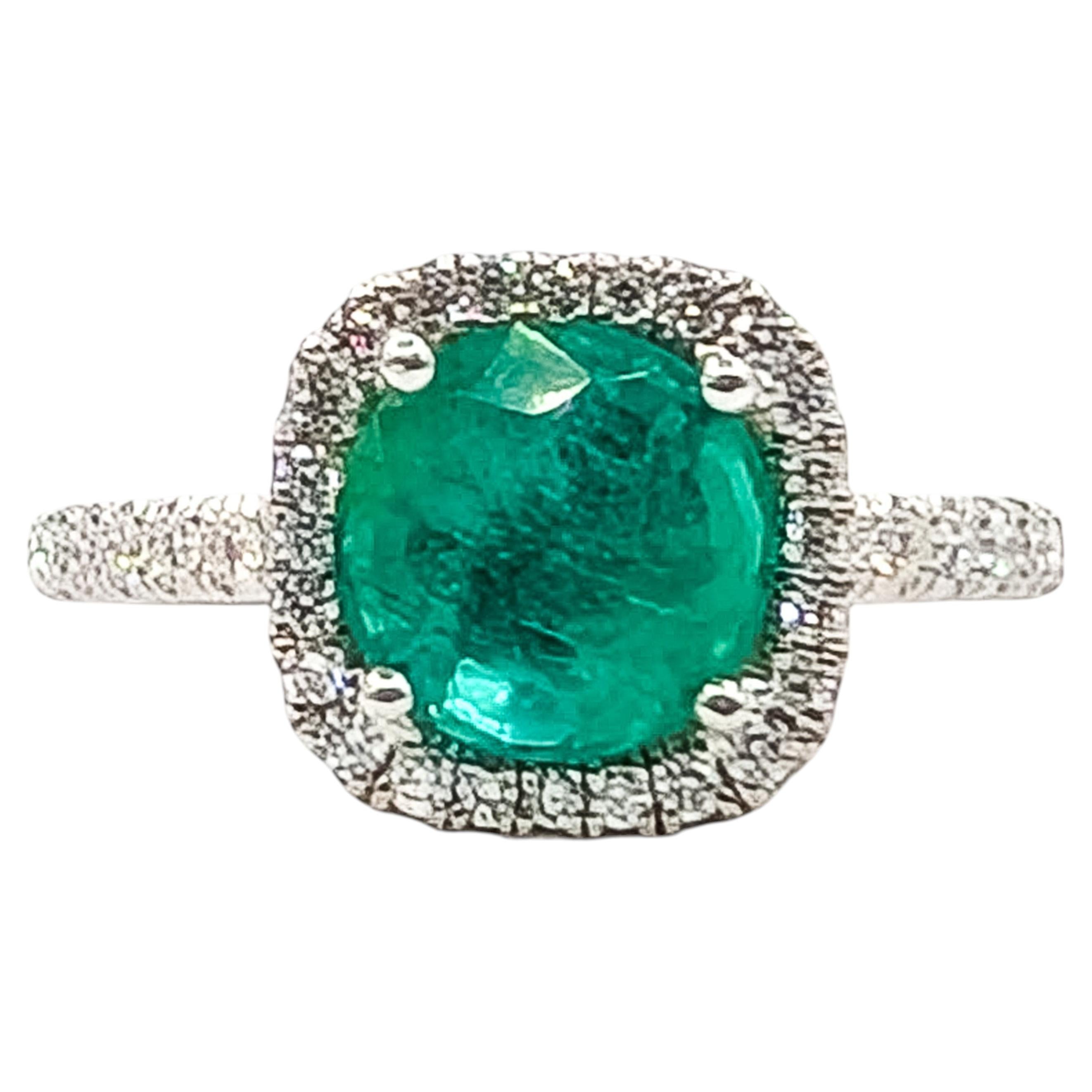 Emerald & Diamond Halo Ring in 18k White Gold