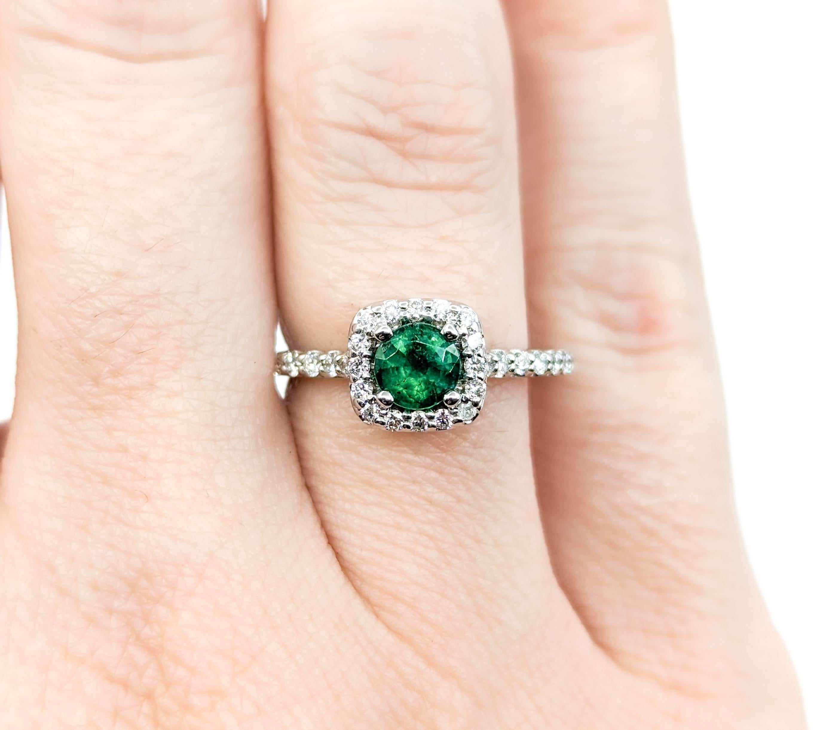 Round Cut Emerald & Diamond Halo Ring in White Gold
