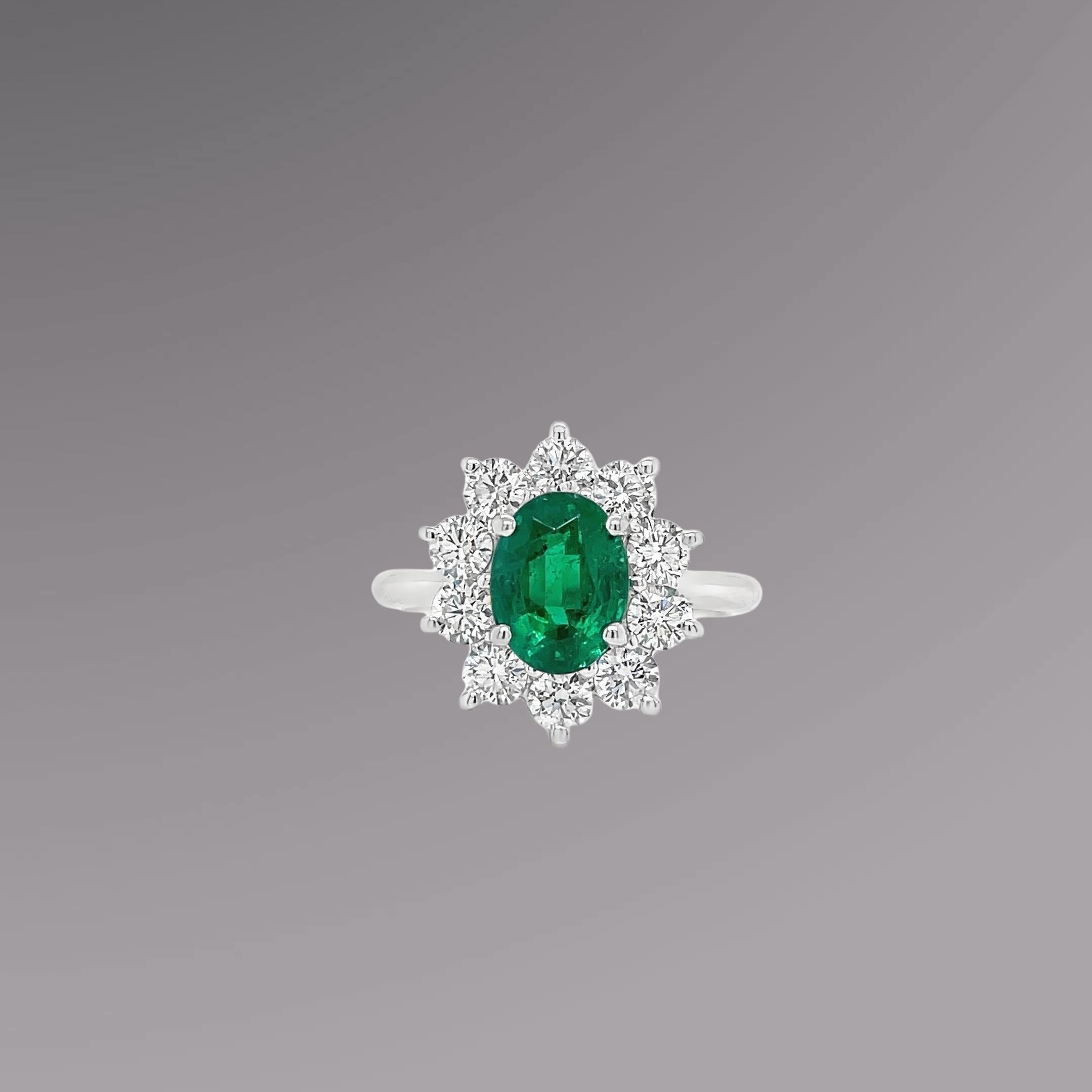 Oval Cut Emerald & Diamond Halo Ring in White Gold For Sale