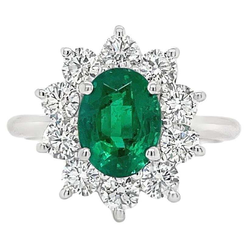 Emerald & Diamond Halo Ring in White Gold