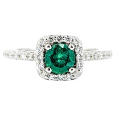 Emerald & Diamond Halo Ring in White Gold