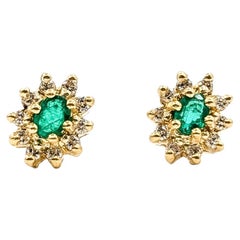 Emerald & Diamond Halo Stud Earrings in 14k Yellow Gold