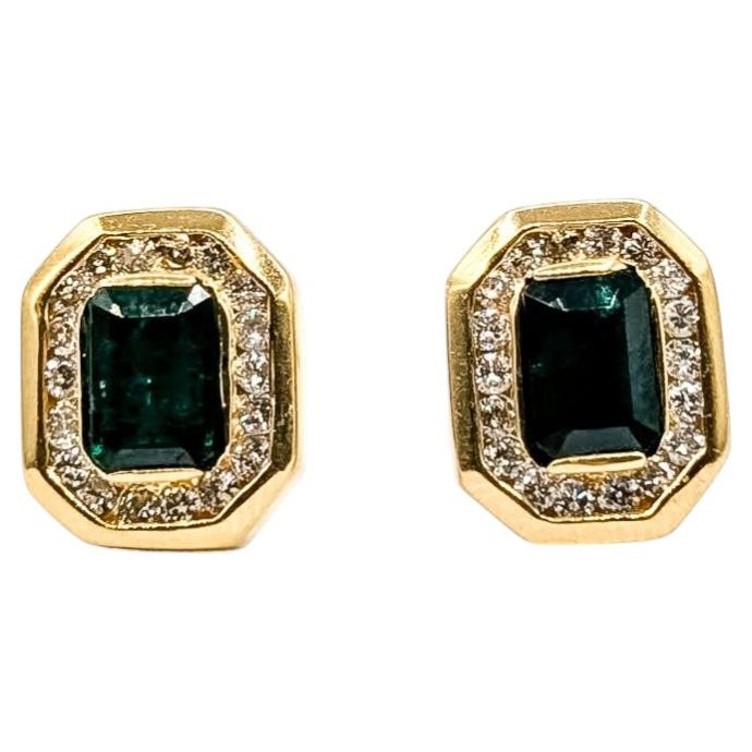 Emerald & Diamond Halo Stud Earrings in 14k Yellow Gold