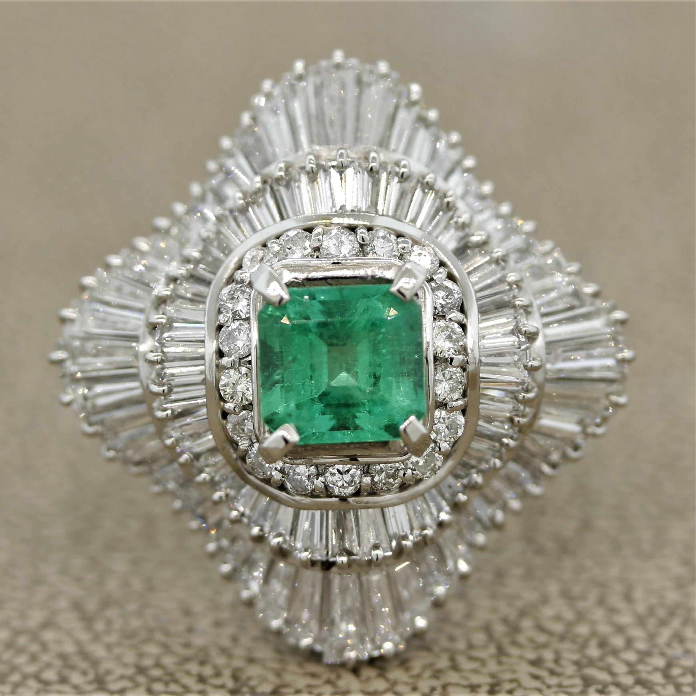 A stunning gemset cocktail ring! It mains a 1.37 carat square cut emerald with a clean and bright green color. It is also relatively clean compared to most other emeralds as there are no major inclusions that take away from the beauty of the stone.