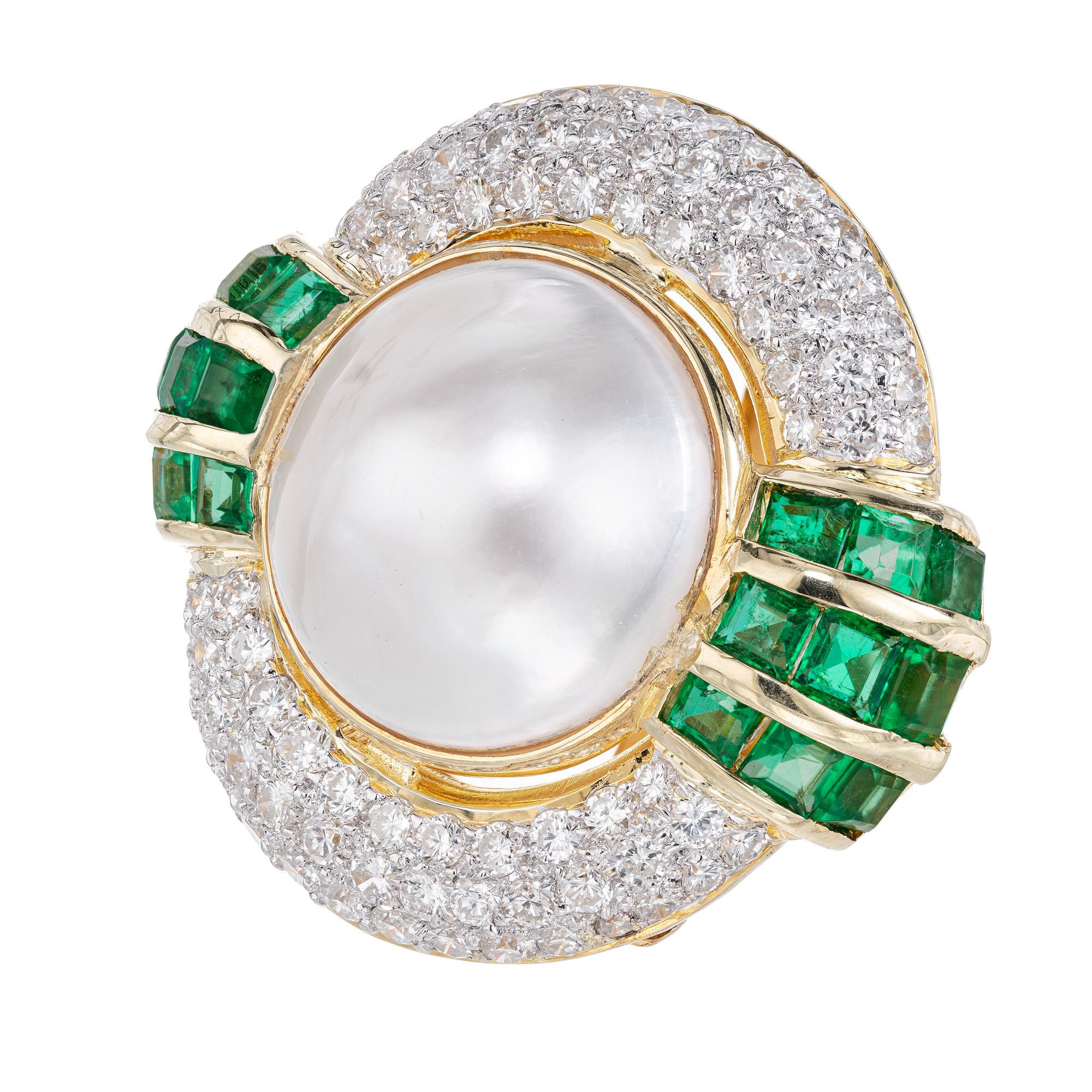 Emerald, diamond, and pearl yellow gold enhancer pendant is a true showcase of elegance and sophistication. It has wonderful multi-use functions such as being a pearl shortener, pearl enhancer, or pendant on a chain. 1 white bezel set mabe pearl