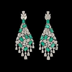 Boucles d'oreilles avec pendentif émeraude et diamant