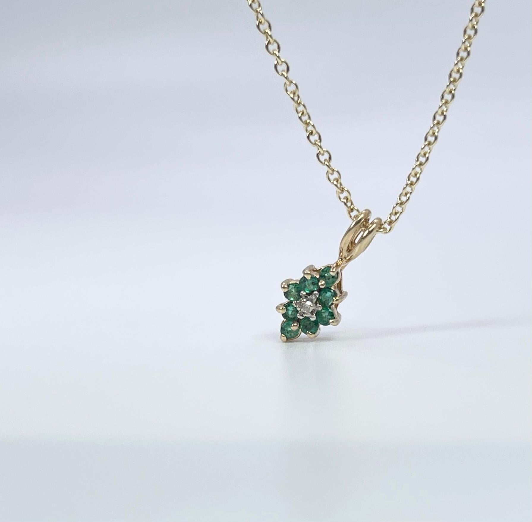 
Small floral pendant in 14KT yellow gold with natural emeralds and diamond in the middle. Pendant comes with chain!

GRAM WEIGHT: 0.90gr
GOLD: 14KT yellow gold
NATURAL EMERALD(S)
Clarity/Color: Heavily Included/Green
NATURAL DIAMOND
Color/Clarity: