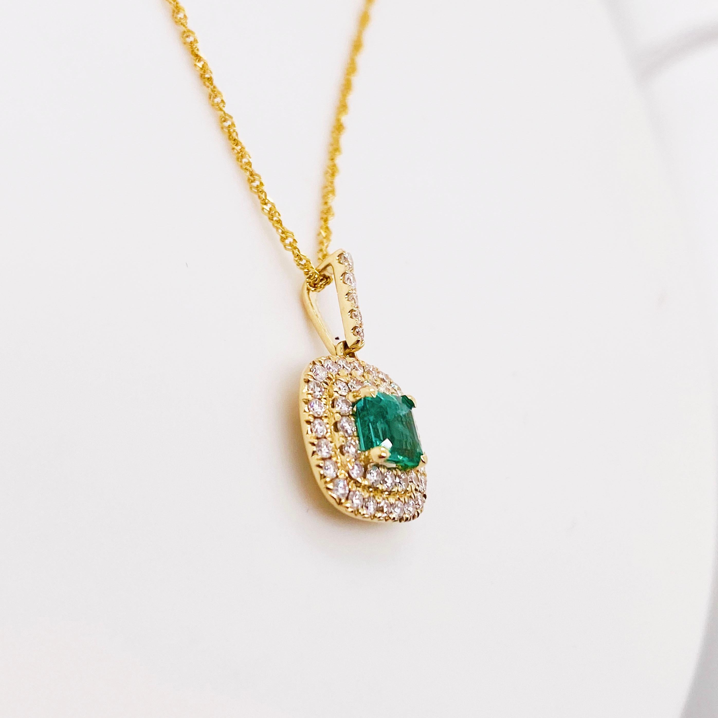 Contemporary Emerald Diamond Pendant with Double Diamond Halo Colombian Emerald For Sale