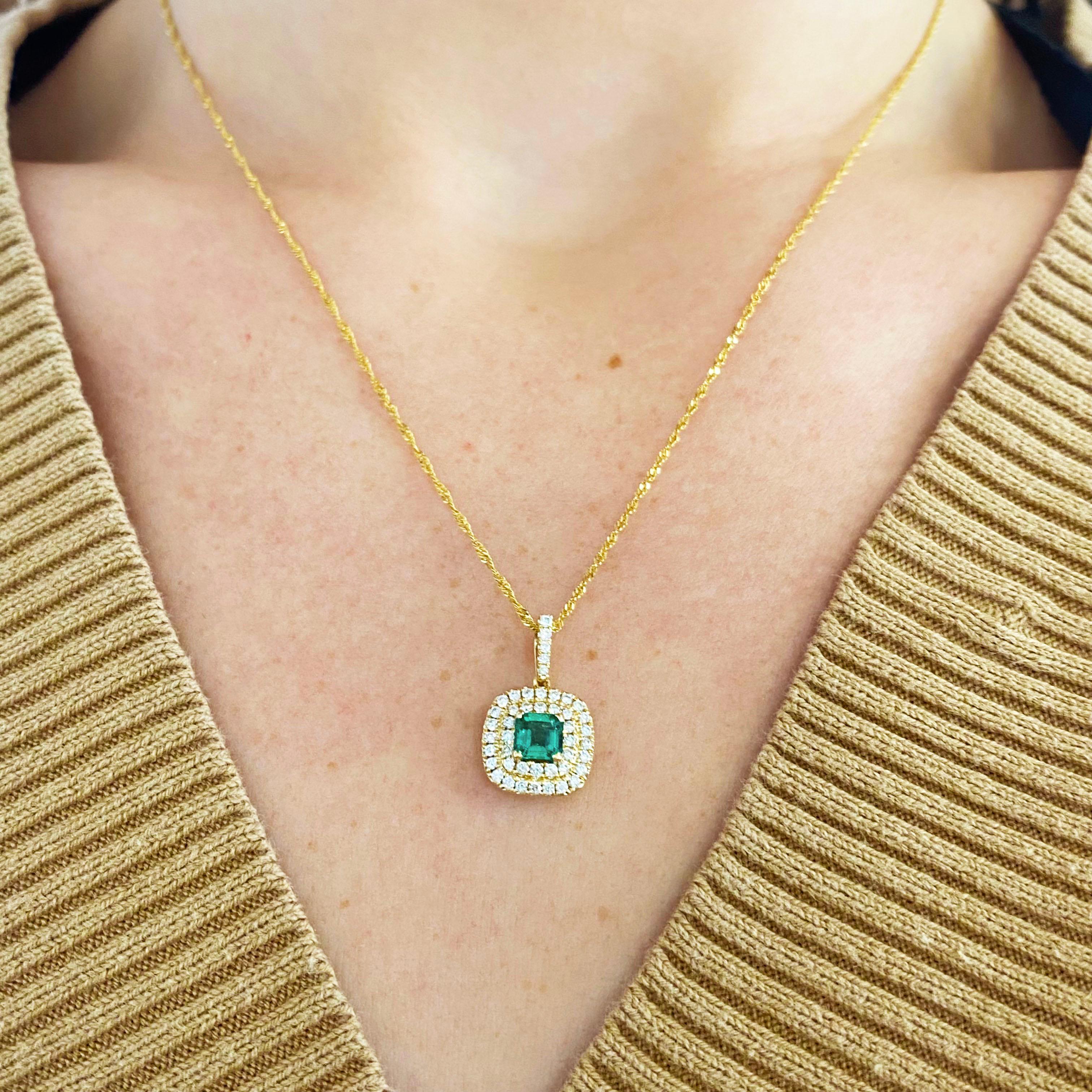Emerald Cut Emerald Diamond Pendant with Double Diamond Halo Colombian Emerald For Sale