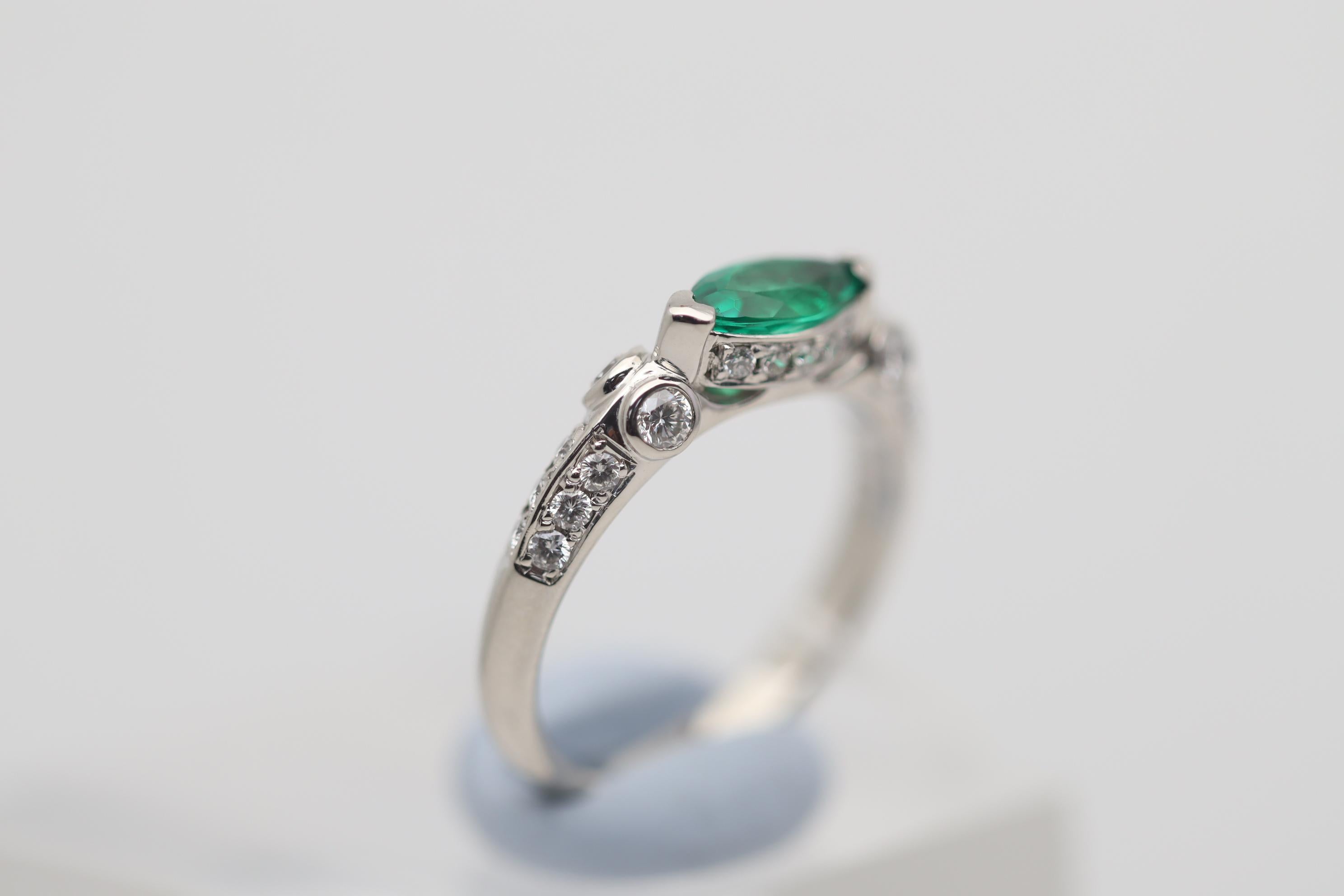 Women's Emerald Diamond Platinum Band Ring For Sale