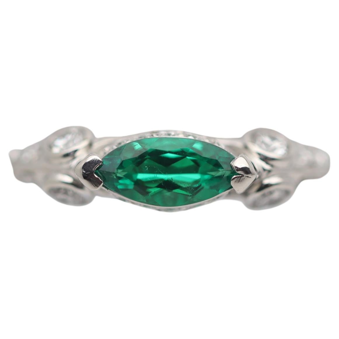 Smaragd-Diamant-Platin-Ring