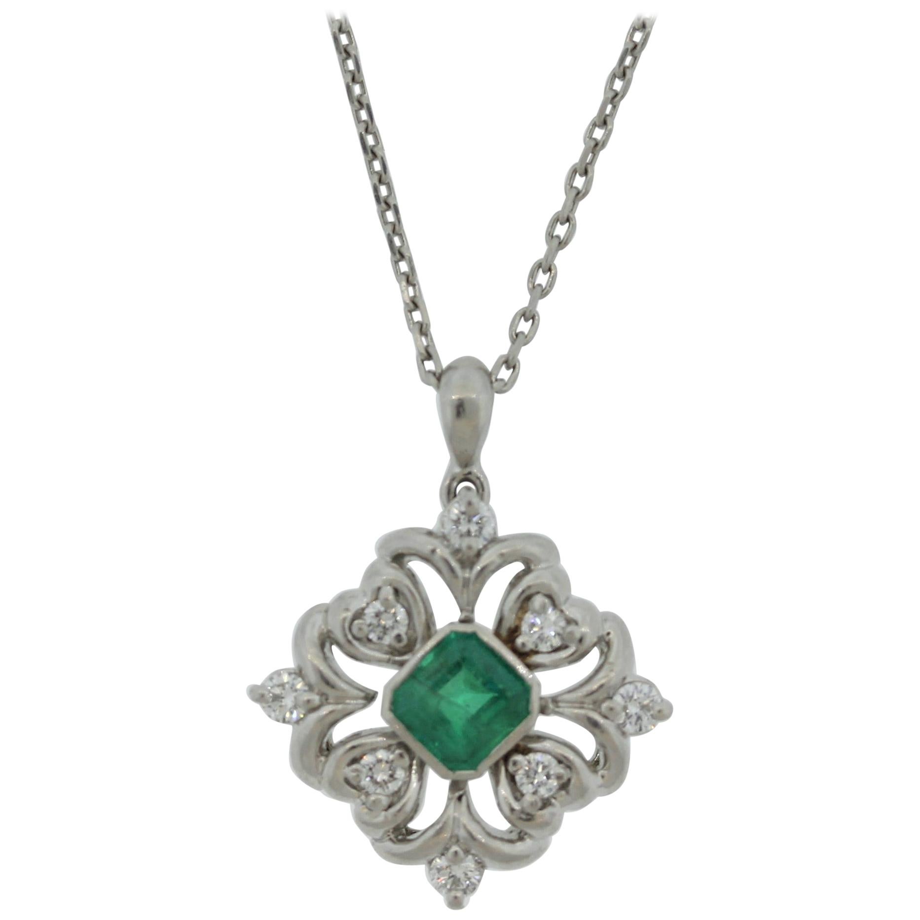 Platinum Diamond and Emerald Shield Shaped Pendant For Sale at 1stDibs