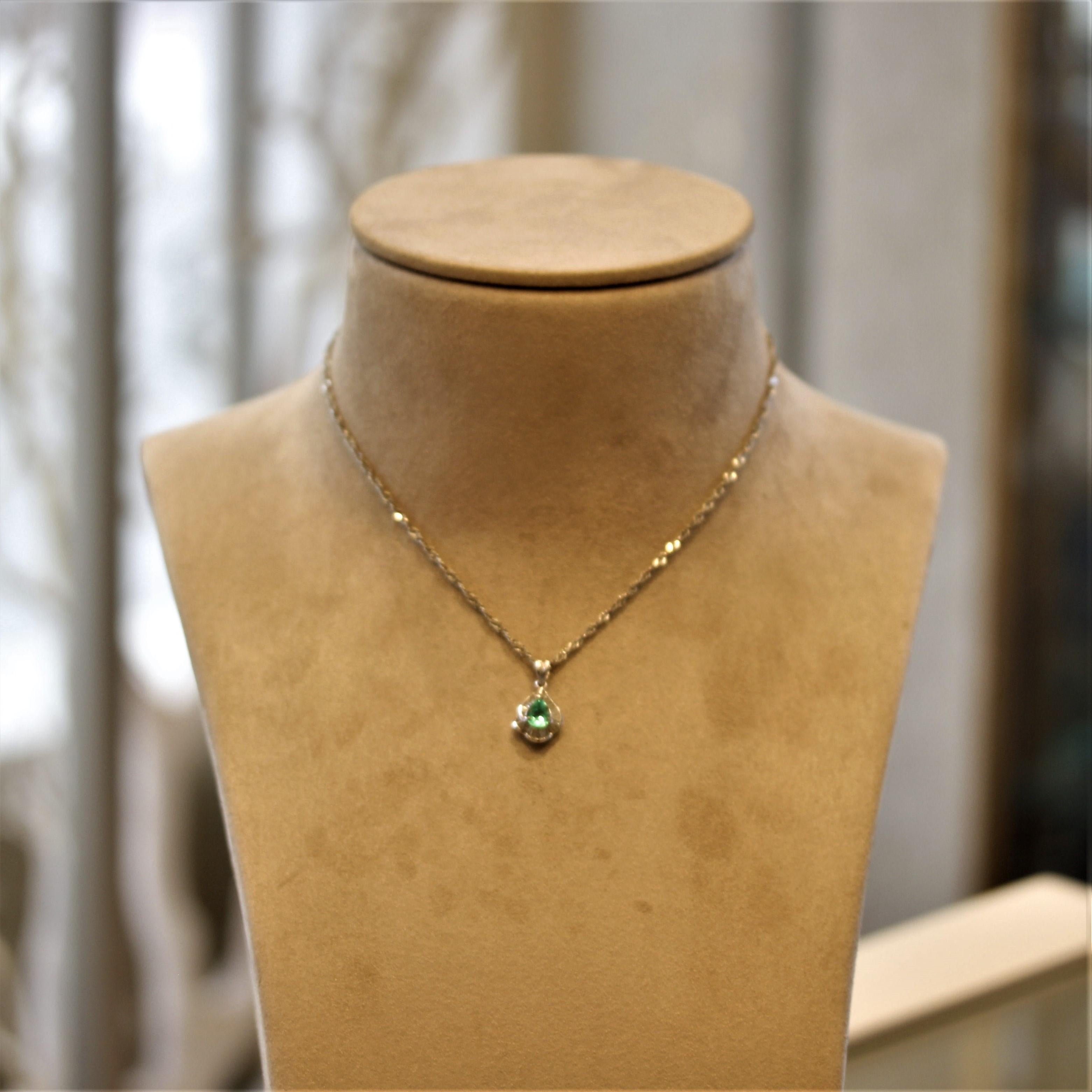 Women's Emerald Diamond Platinum Pendant