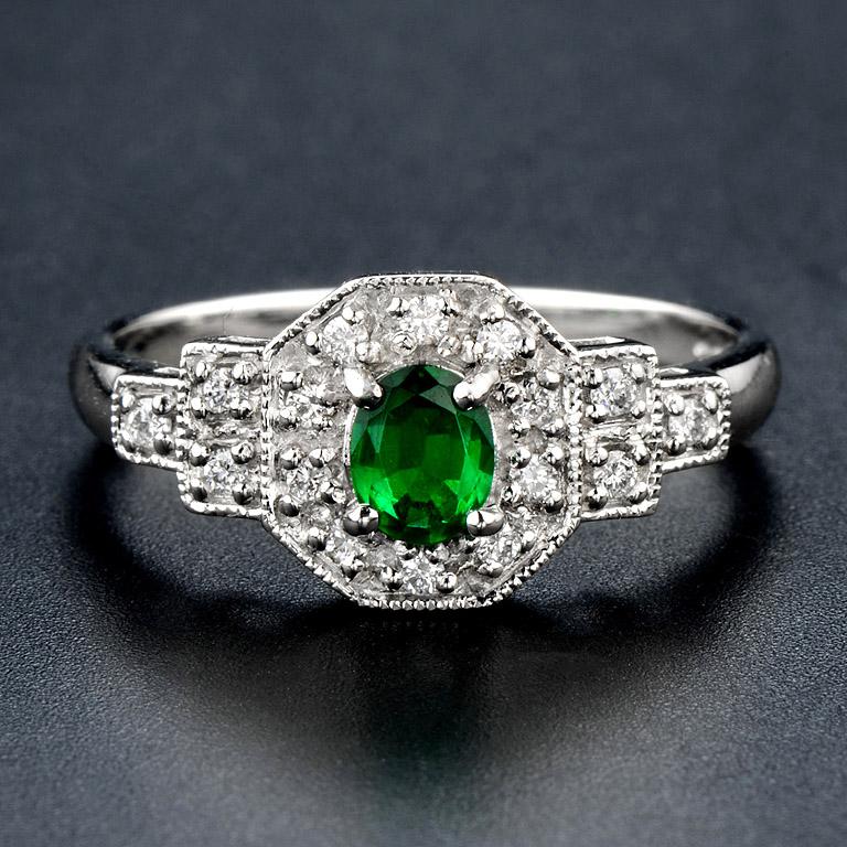 This vintage style ring was made in Platinum 950, the highest precious in metal.

The ring consists of...
Center Emerald 0.30 ct.
Total Diamond G color VS clarity 16 pcs. 0.16 ct.

The ring was made in size US#7

* The ring can be size 1 size