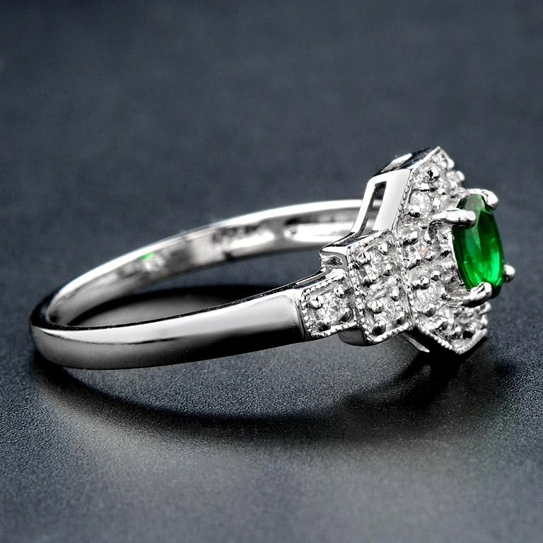 Oval Cut Emerald Diamond Platinum Ring