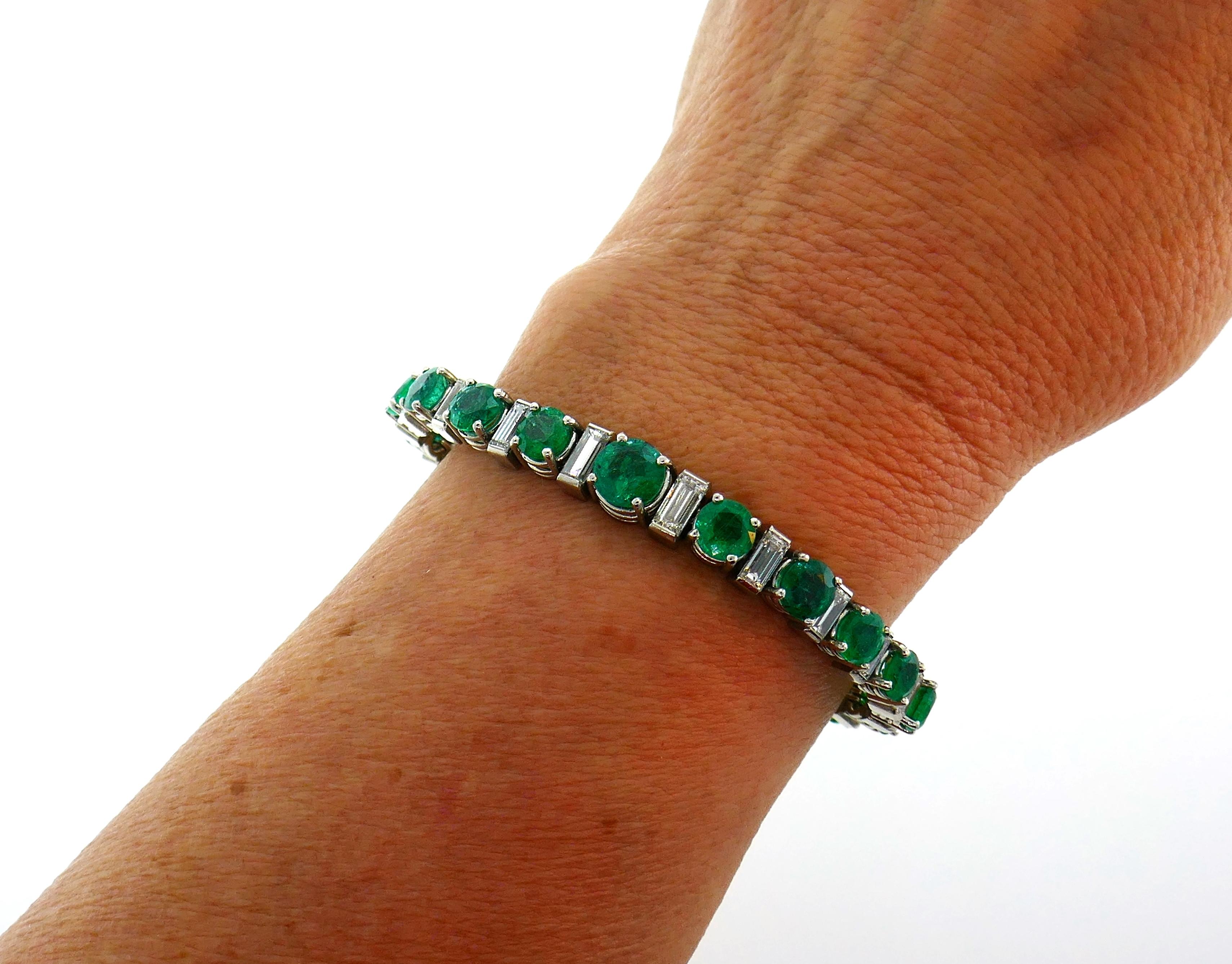 Stunning emerald and diamond platinum tennis bracelet created in France in the 1950s. Timeless and classy. Substantial on its own and great for piling up! Must have!
The bracelet designed as a graduating line featuring nineteen round faceted