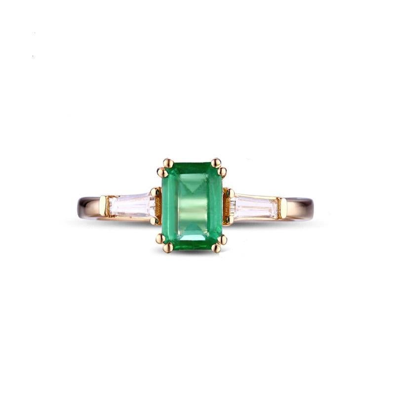 

0.62 Carat Emerald Ring with a baguette diamond at each side set in 14 Karat Yellow Gold and also its in a Emerald Cut.. Simple and Elegant and if are wanting something specify let us know or any questions 


Emerald Gold Ring
Cut  Emerald 	

 