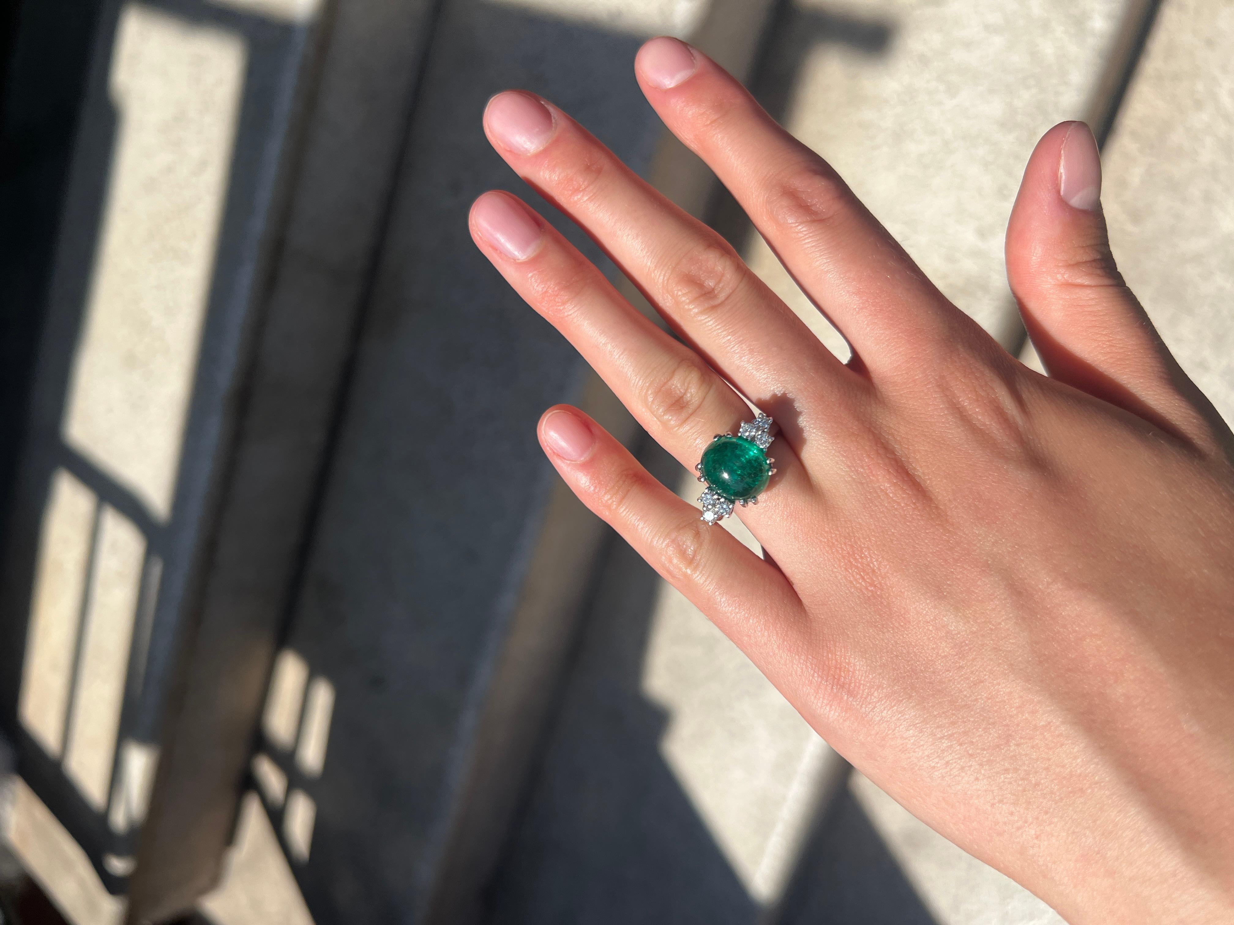 The stunning emerald diamond ring from the 1970s is a mesmerizing piece of jewelry that exudes elegance and charm. Set in white gold, this ring showcases a captivating emerald gemstone at its center, radiating a vibrant and enchanting green hue. The