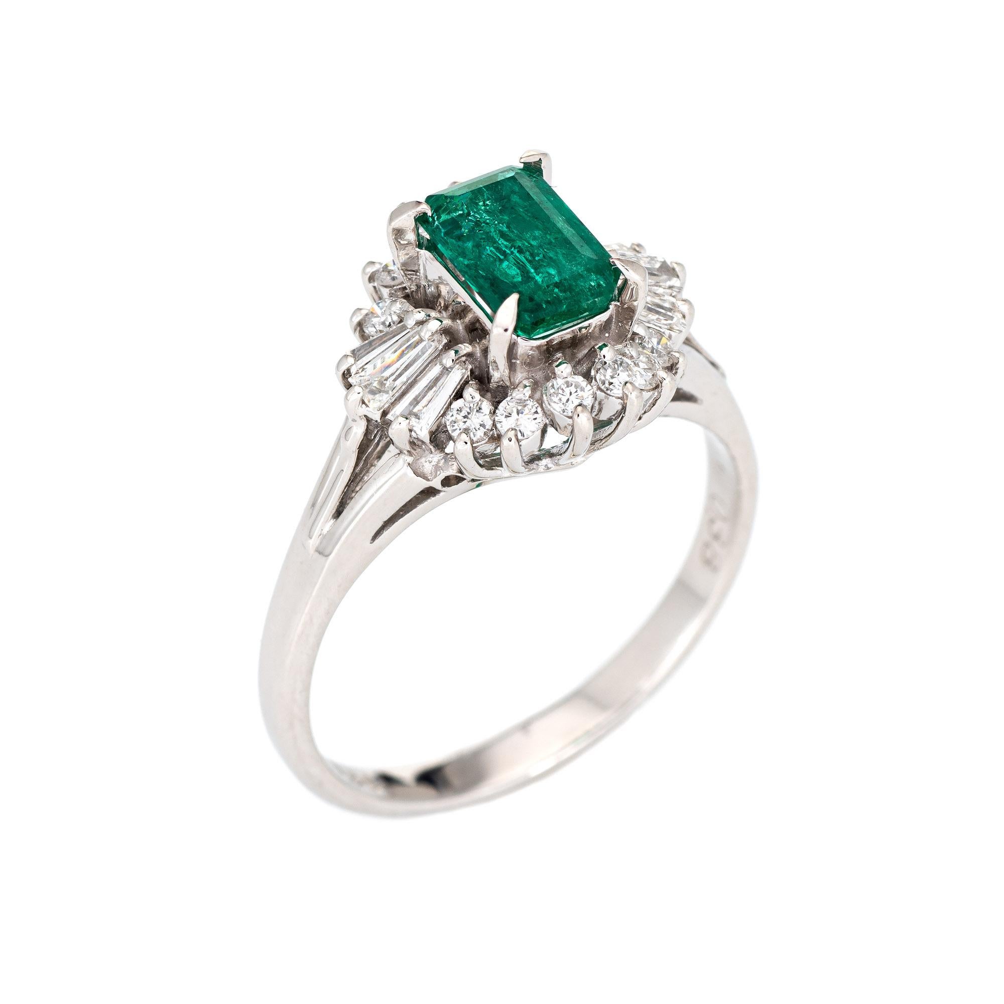 Stylish emerald & diamond ring (circa 2000s) crafted in 900 platinum. 

Round brilliant and straight baguette cut diamonds total 0.38 carats (estimated at G-H color and VS2-SI1 clarity). The emerald measures 7.25mm x 5mm (estimated at 0.88 carats).