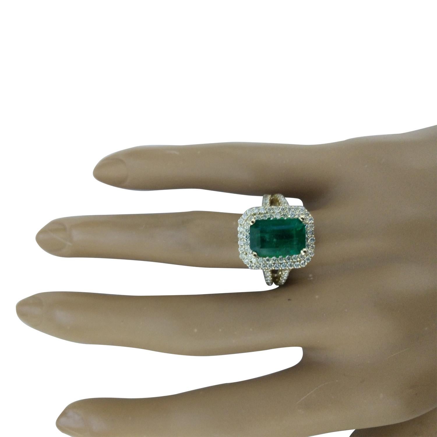 4.42 Carat Natural Emerald 14 Karat Solid Yellow Gold Diamond Ring
Stamped: 14K 
Total Ring Weight: 7.1 Grams
Emerald Weight: 3.42 Carat (11.00x9.00 Millimeters)  
Diamond Weight: 1.00 Carat (F-G Color, VS2-SI1 Clarity )
Diamond Quantity: 93
Face