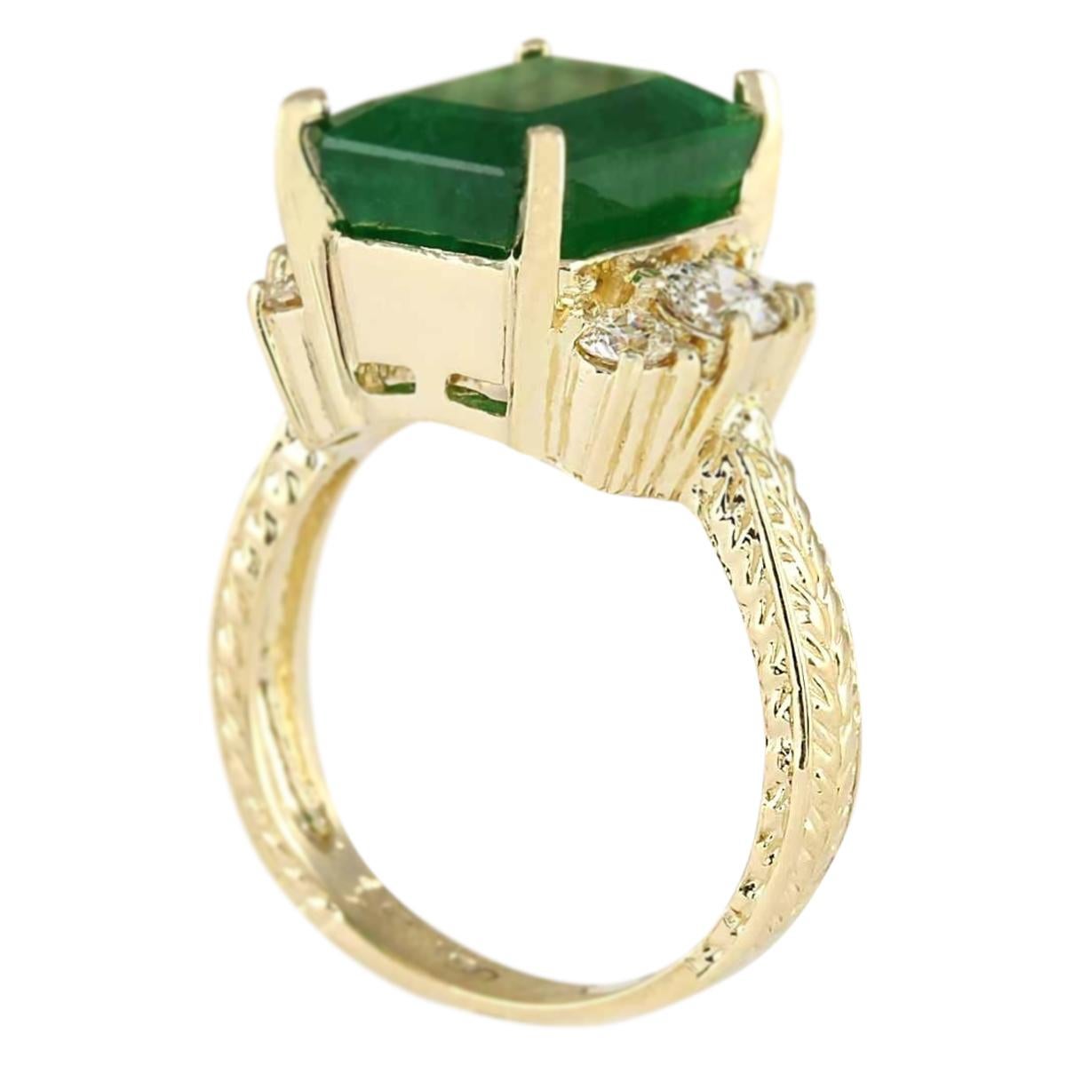 Modern Emerald Diamond Ring In 14 Karat Yellow Gold For Sale