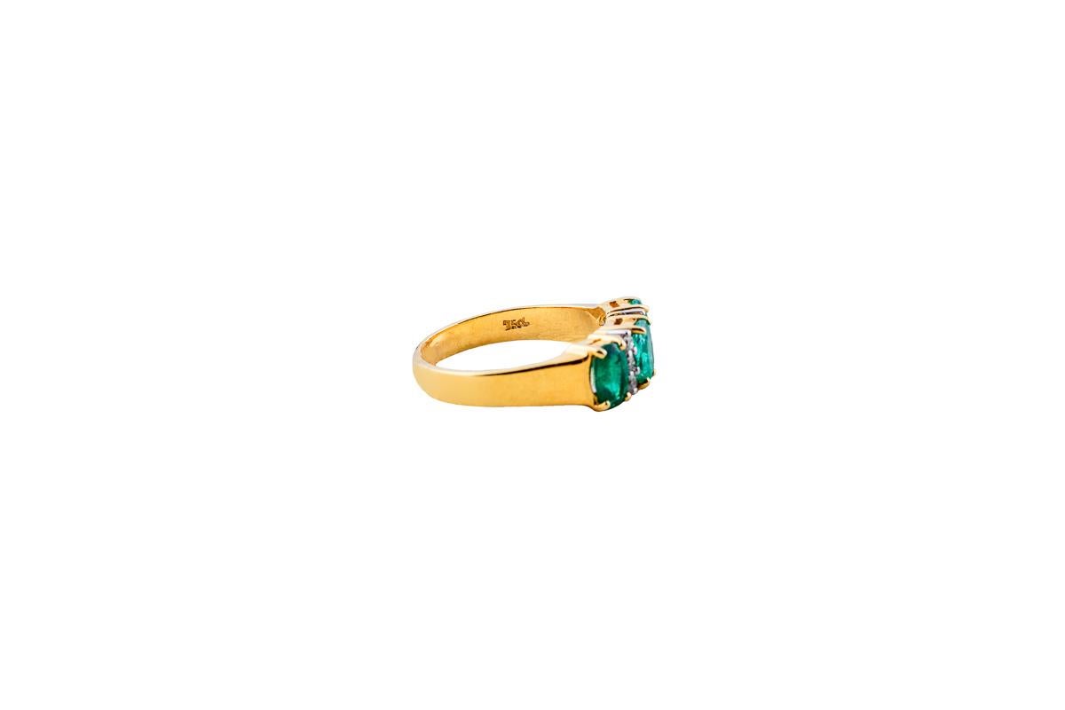 Emerald Diamond Ring in 18 Karat Yellow Gold 1
