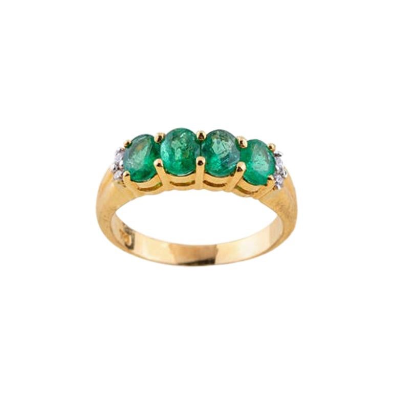 Emerald Diamond Ring in 18 Karat Yellow Gold