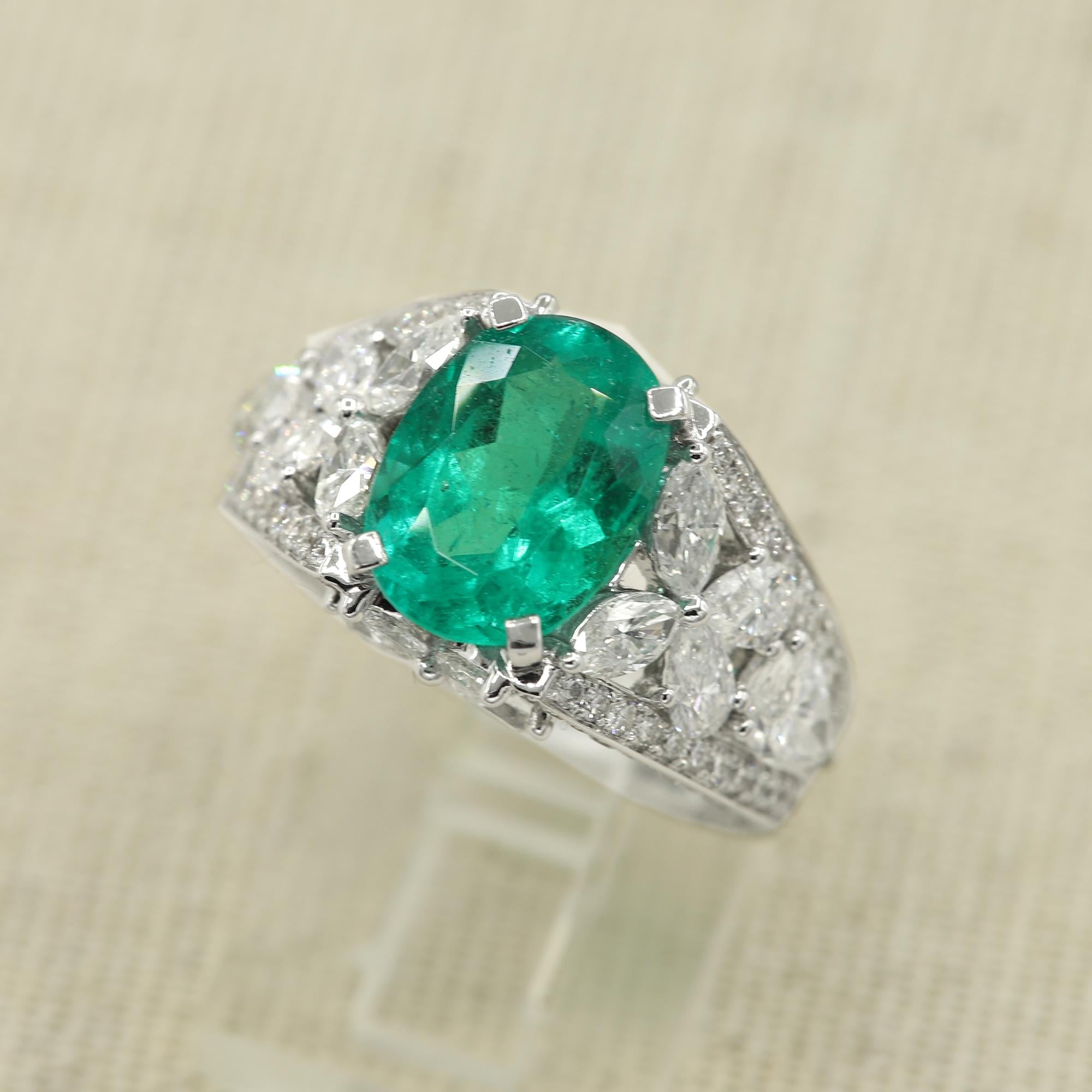 Fancy Emerald with Mix shaped Diamonds, Pear, Round & Marquise. 
Emerald is 3.44 carat / 12 x 8.5 mm. medium hue color total of all Diamonds 4.34 carat GH-VS-SI.
18k White Gold 11.0 grams.
Finger size 7

 