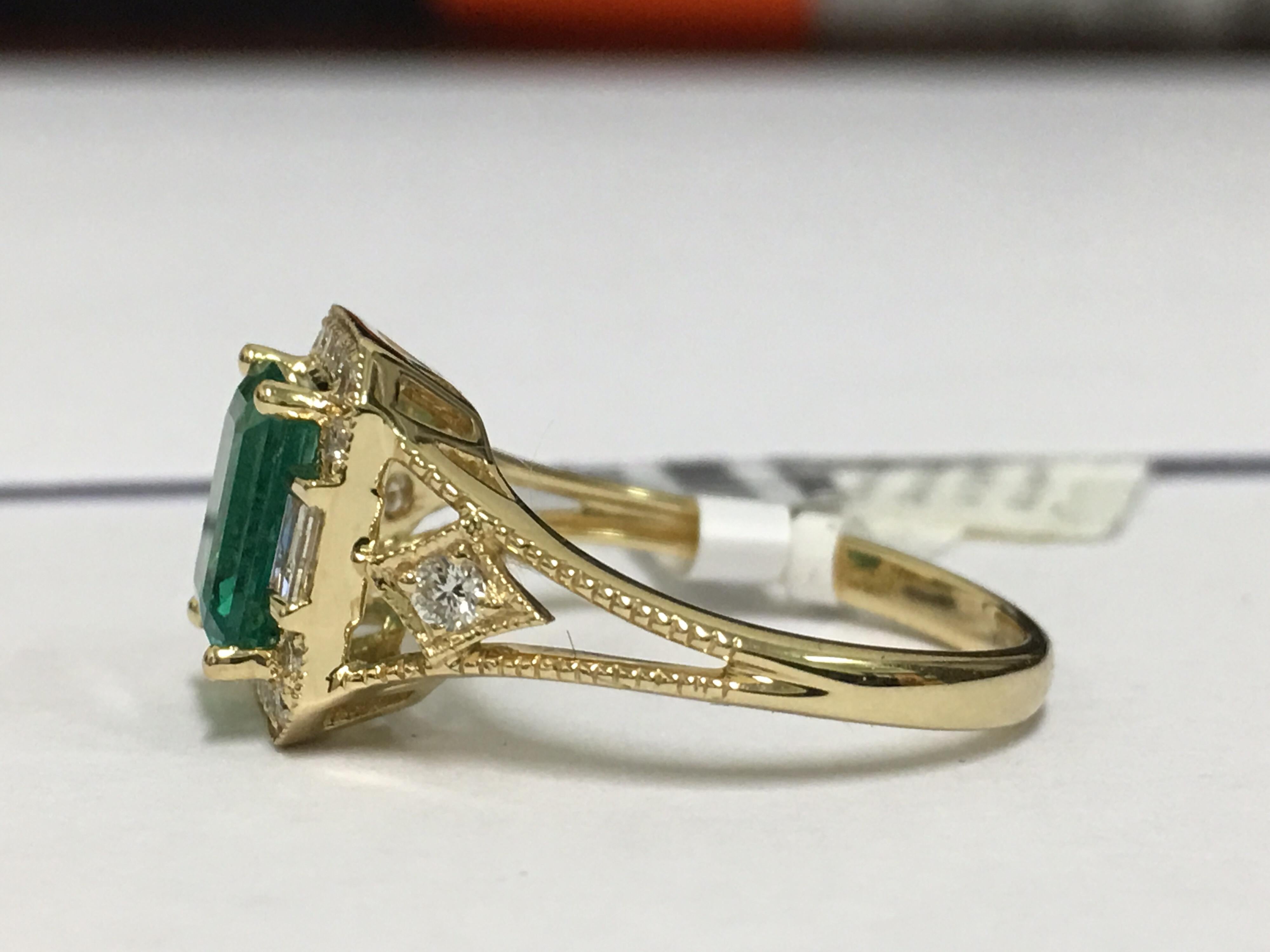 Natural emerald and Diamond Ring is one of a kind handcrafted ring set in 18 Karat Yellow Gold.
The emerald cut Emerald is 1.38 Carat. Two Baguette diamonds are 0.13 Carat and other white round diamonds are 0.22 Carat total of 0.35 Carat.Total Gold